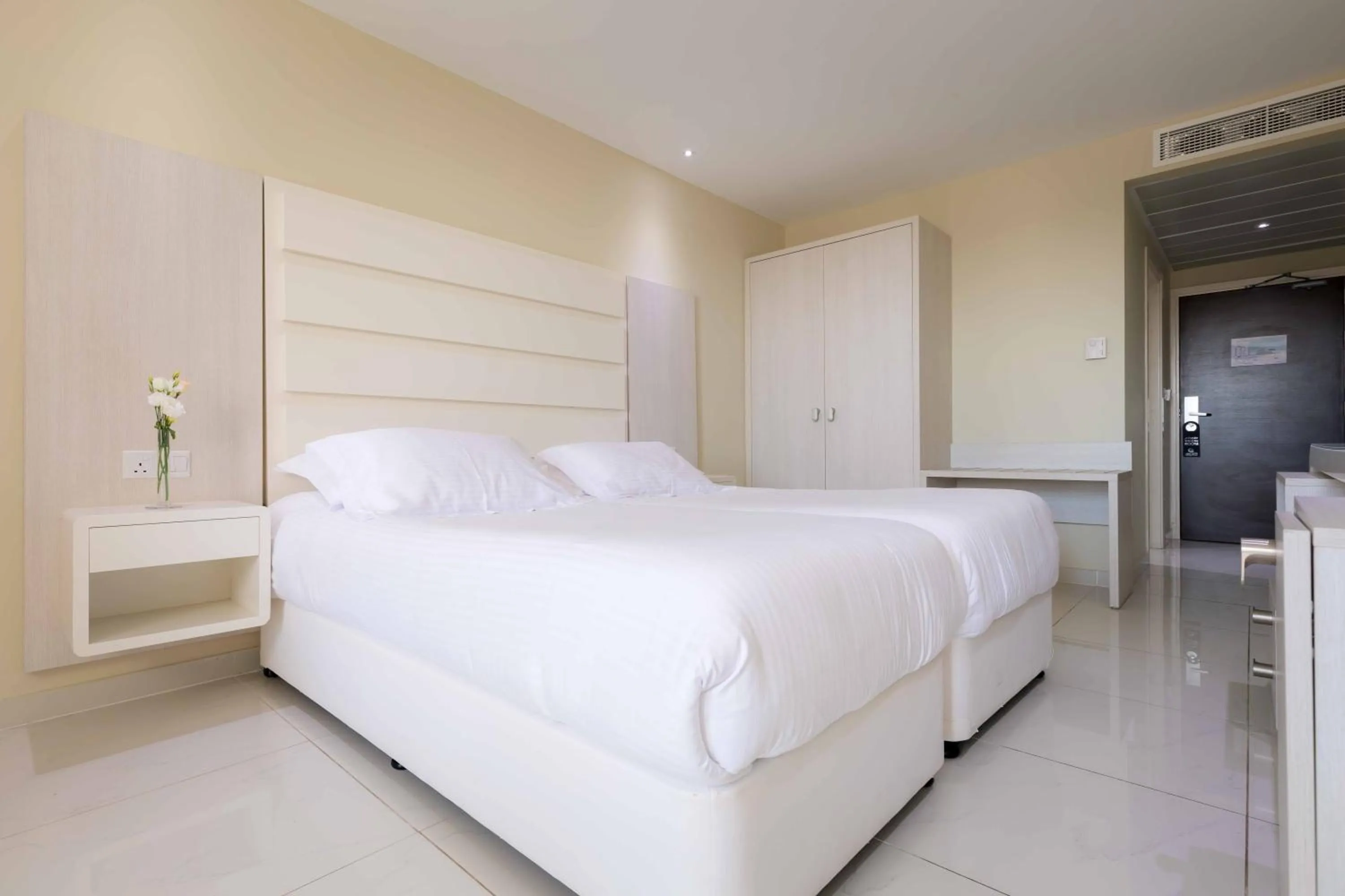Bedroom, Bed in Tasia Maris Beach Hotel - Adults Only