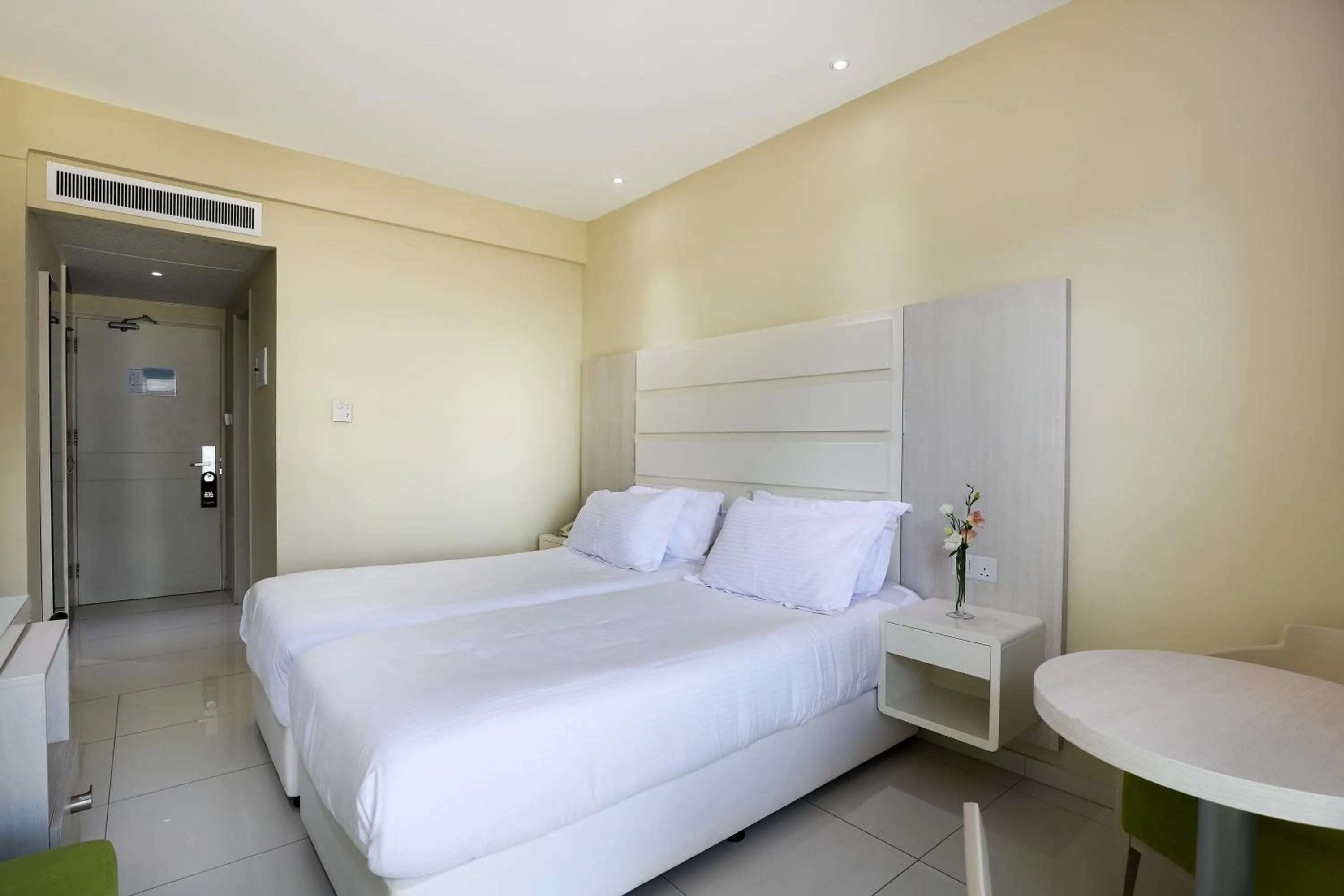 Bed in Tasia Maris Beach Hotel - Adults Only