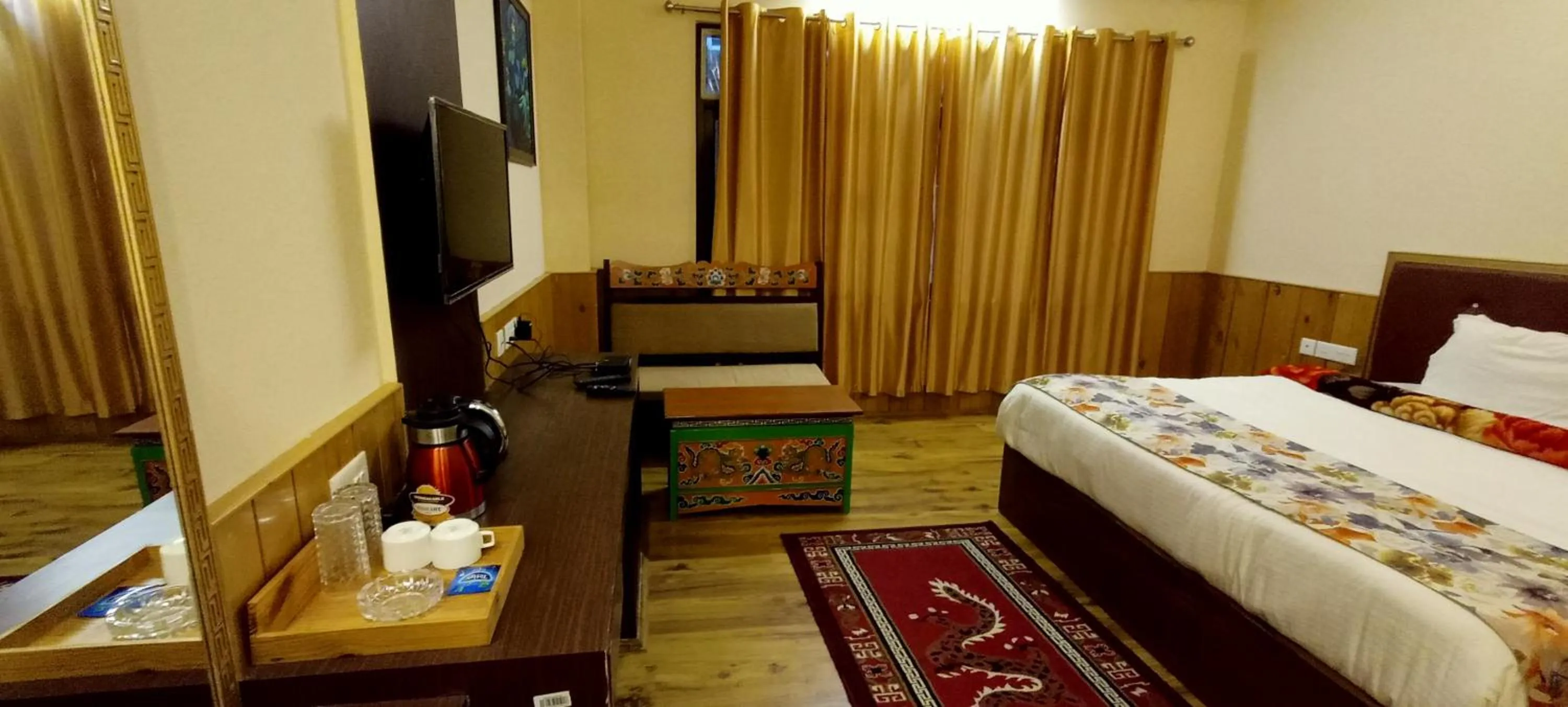 Photo of the whole room, Bed in Le Coxy Resort Lachung