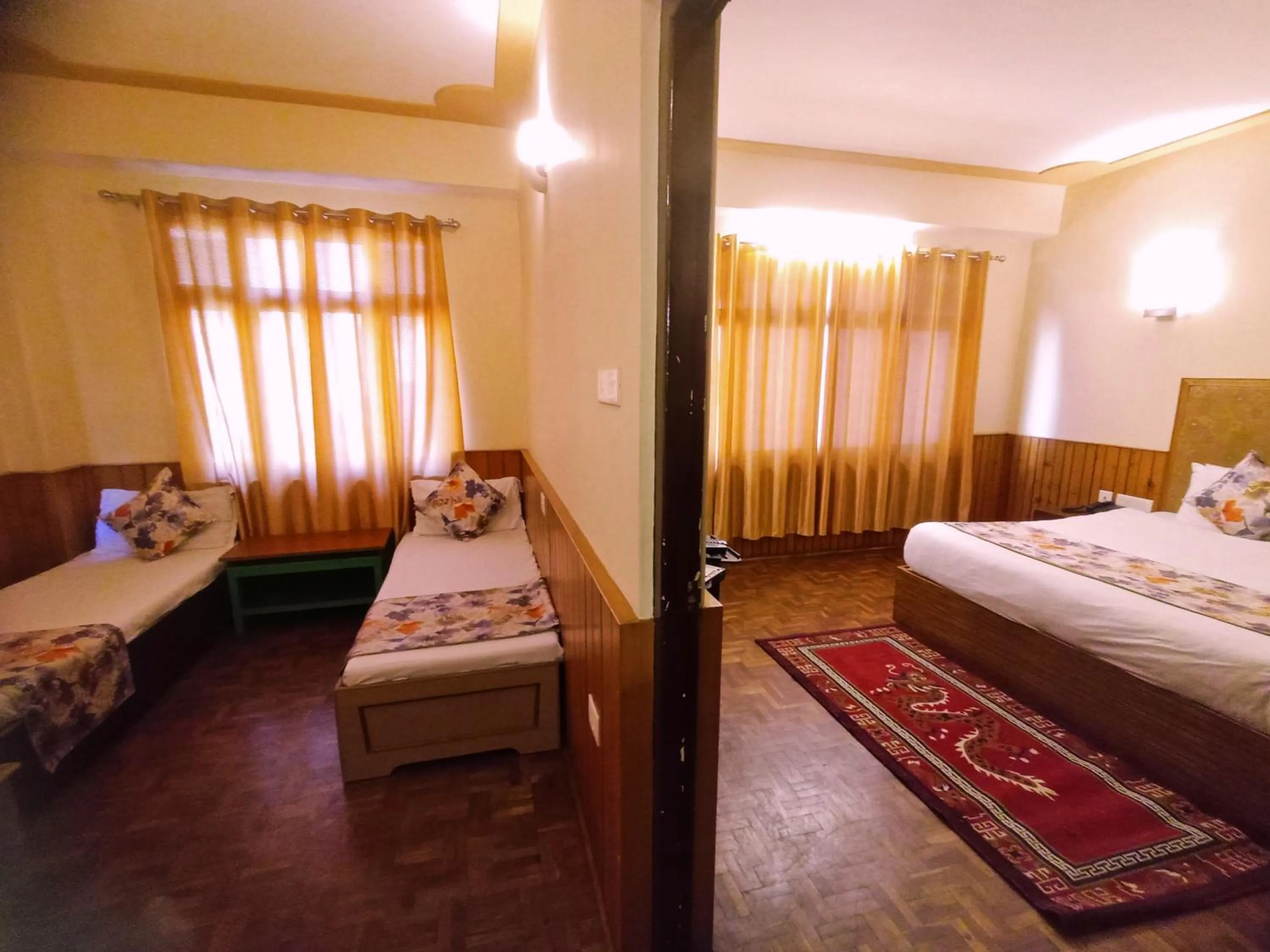Photo of the whole room, Bed in Le Coxy Resort Lachung