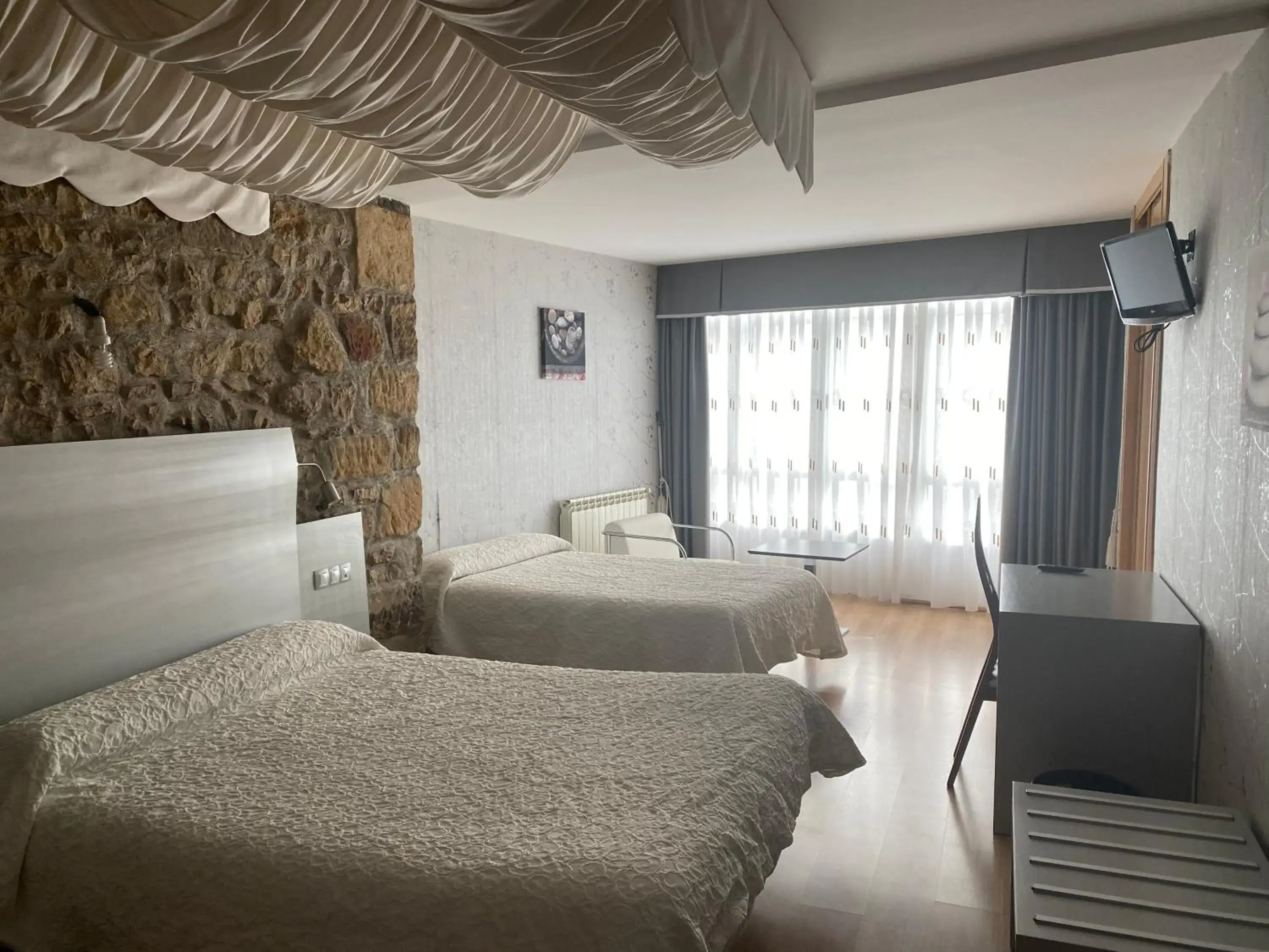 Triple Room with Bathroom in EL CAPRICHO DE CLEMENTE Triple Room with Bathroom in EL CAPRICHO DE CLEMENTE