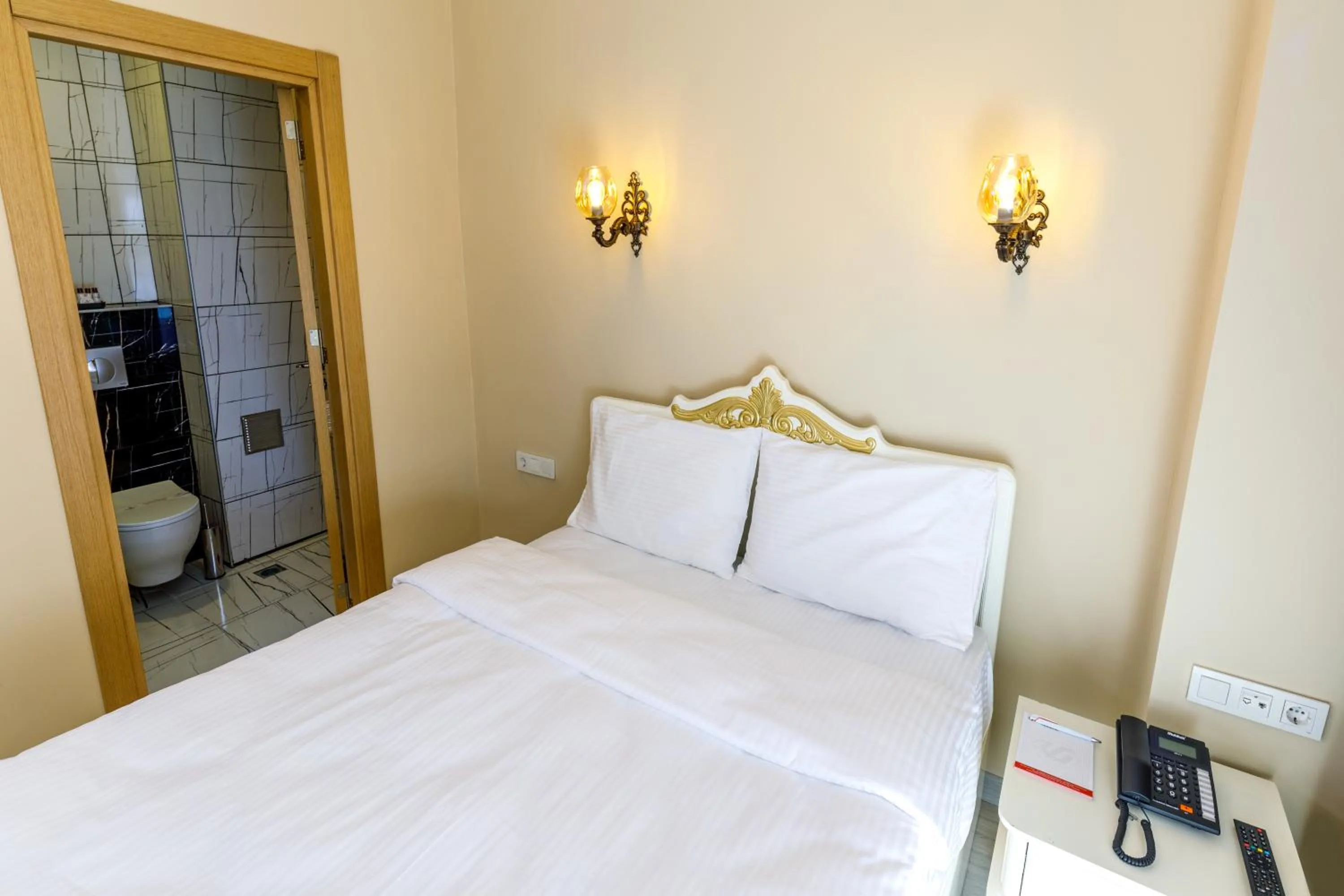 Bed in Germenicia Hotel