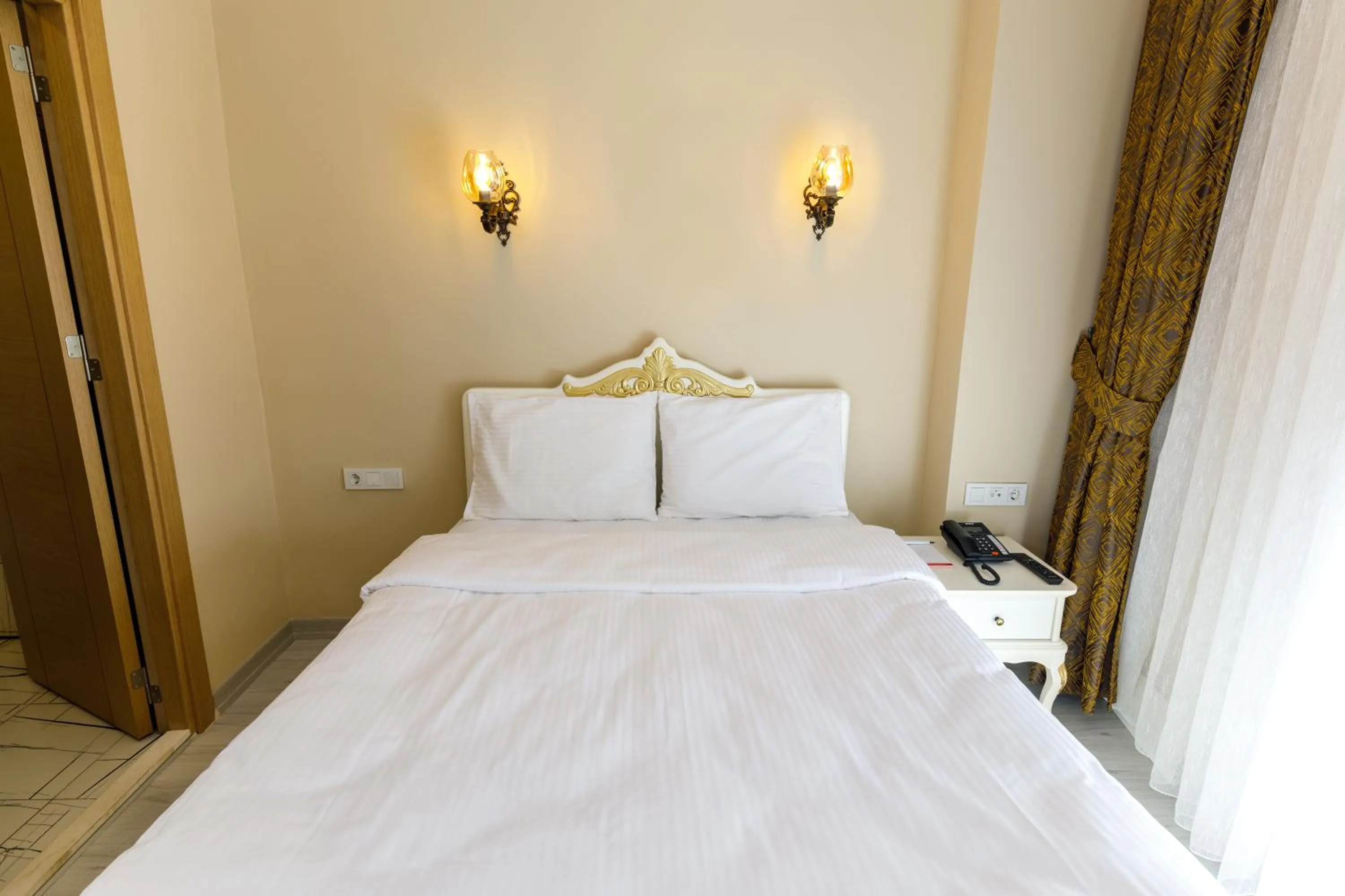 Bed in Germenicia Hotel