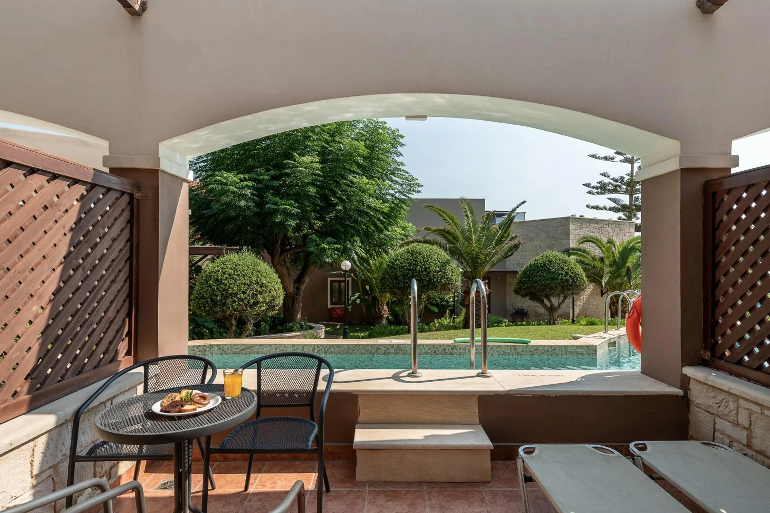 Family Suite with Garden View and Sharing Pool in Caldera Creta Paradise