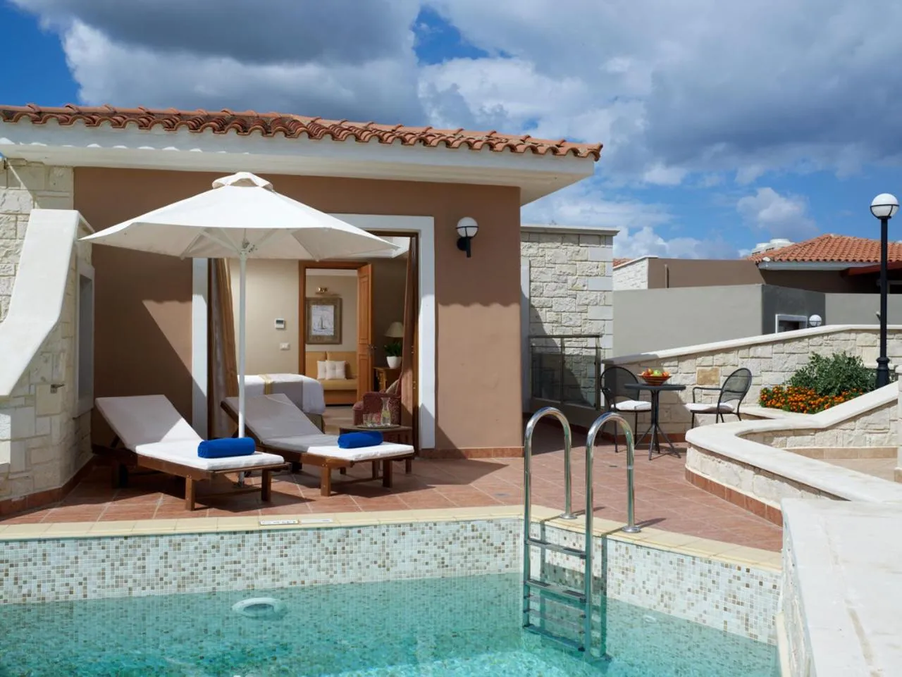 Family Room with Garden View and Sharing Pool in Caldera Creta Paradise