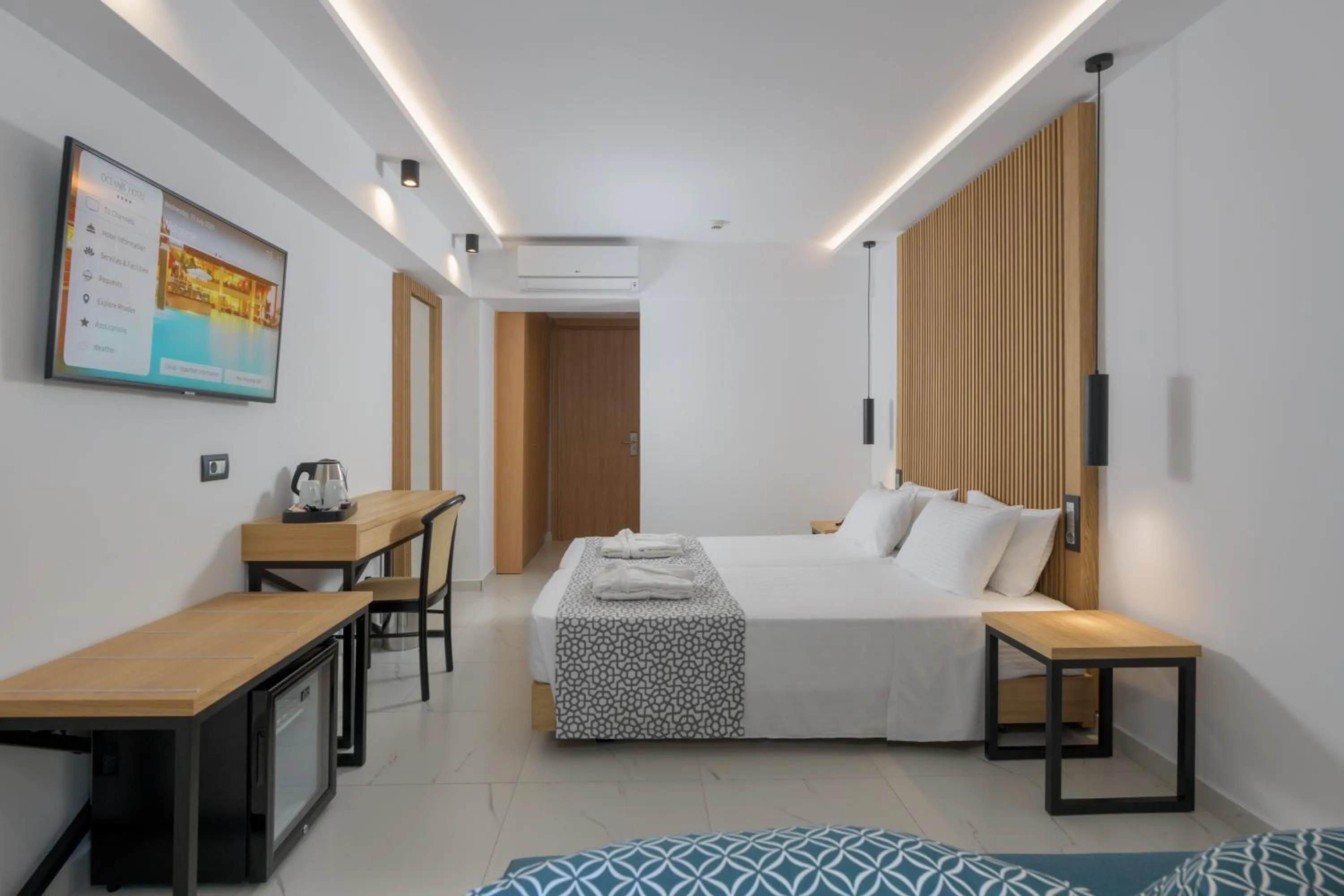 Bed in Oceanis Beach Hotel