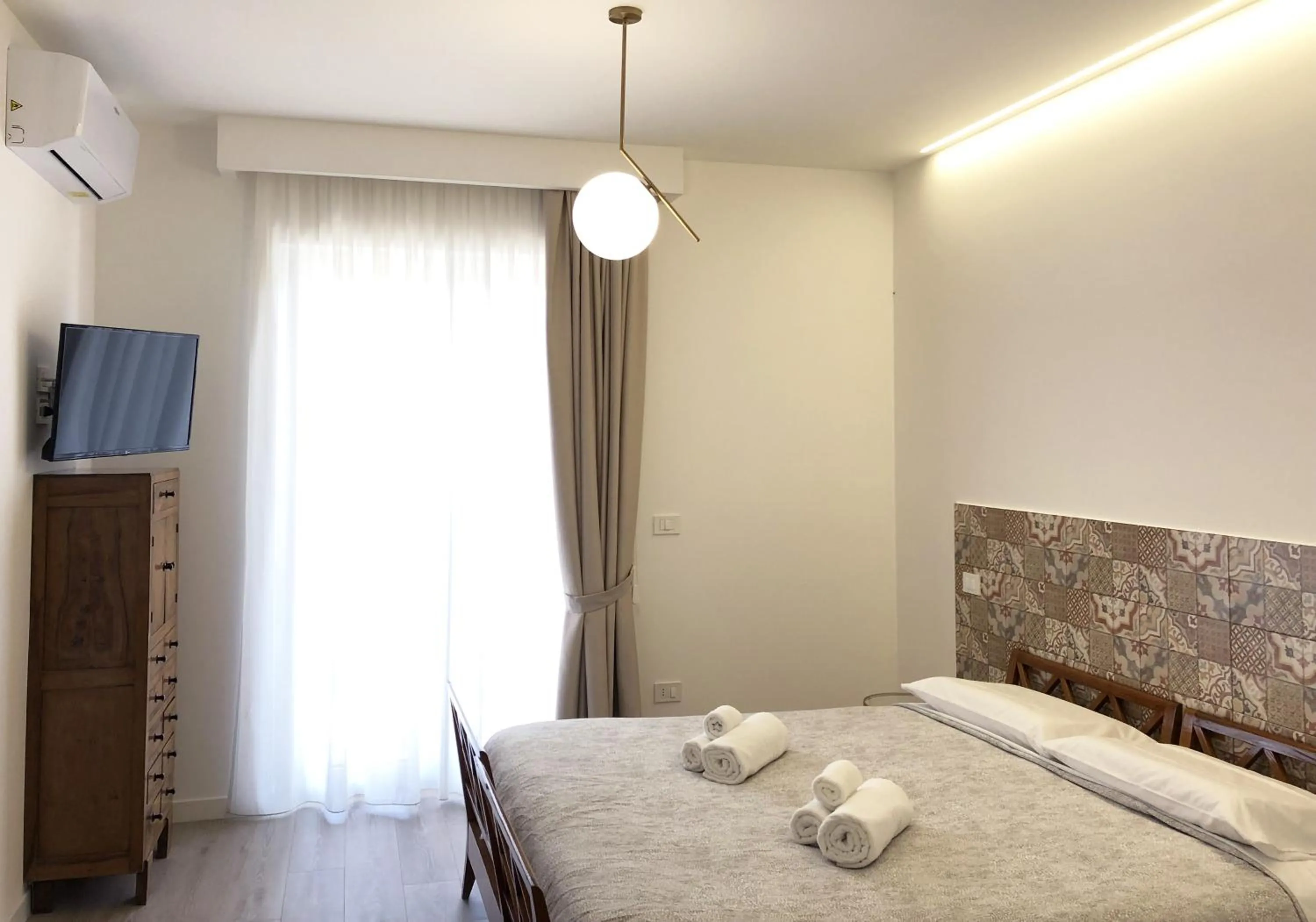 Bed in Accòmodati - Camere e Appartamenti