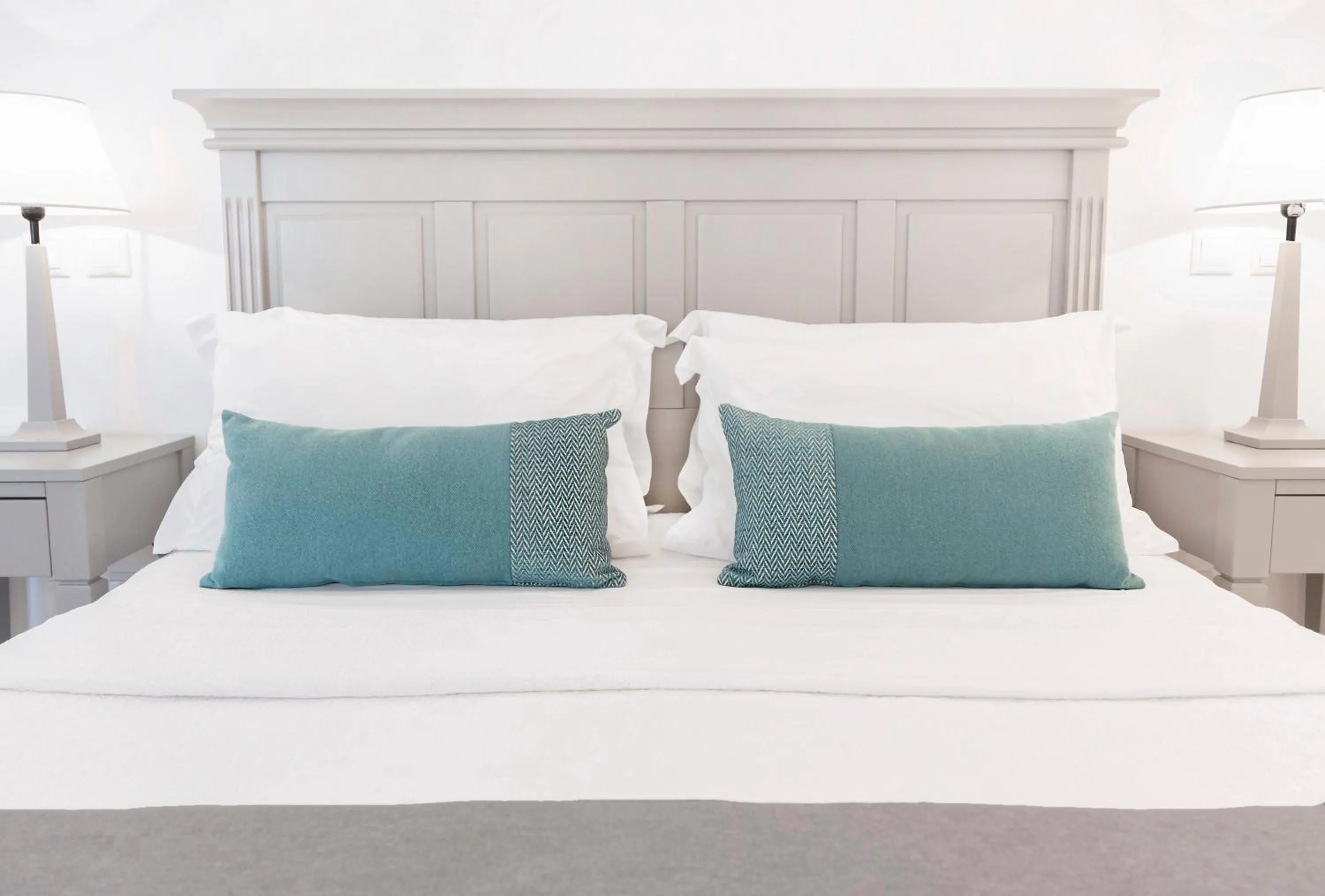 Bed in Stelia Mare Boutique Hotel