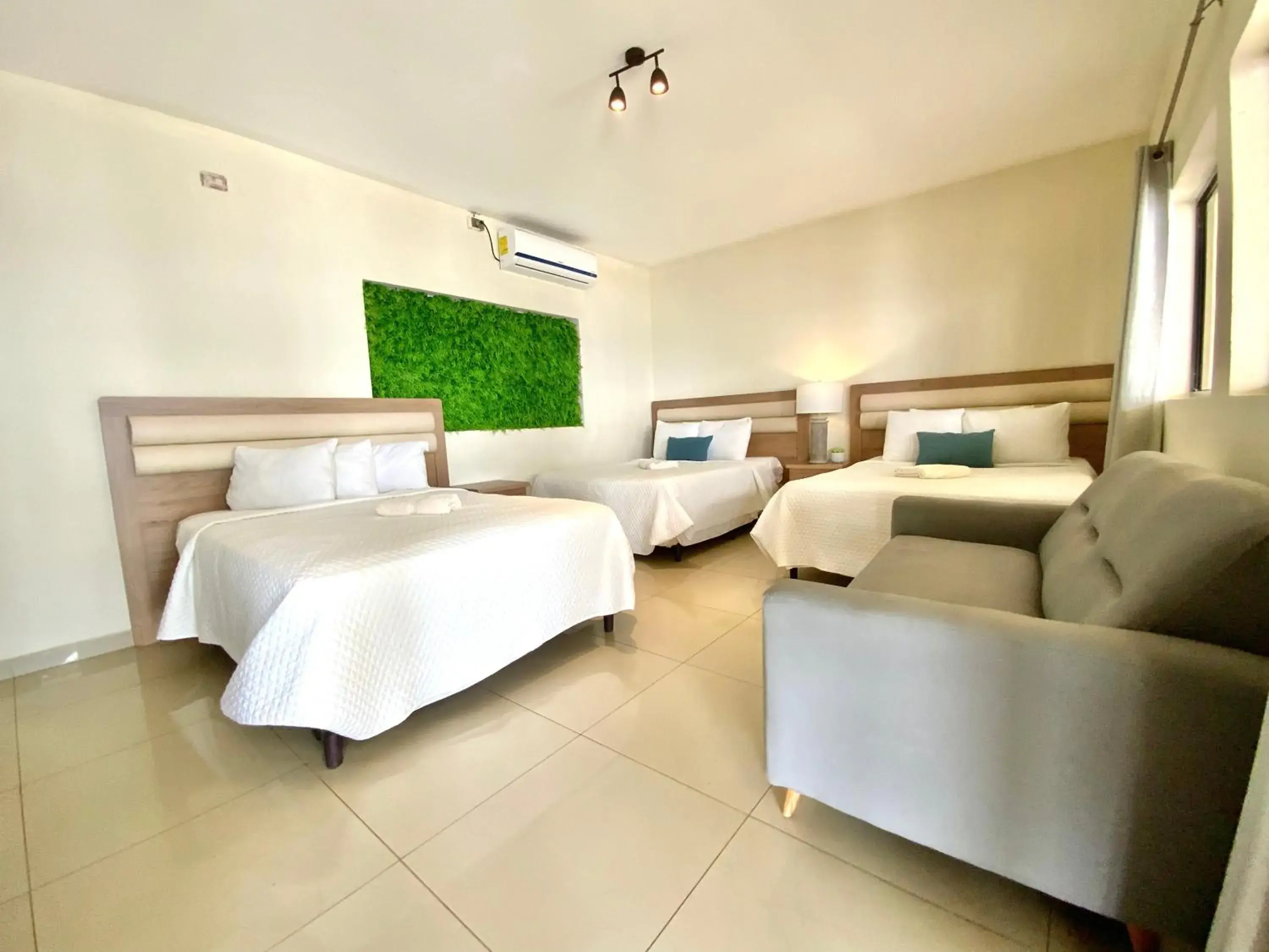 Basic Triple Room in Paradise Surf Hotel Basic Triple Room in Paradise Surf Hotel