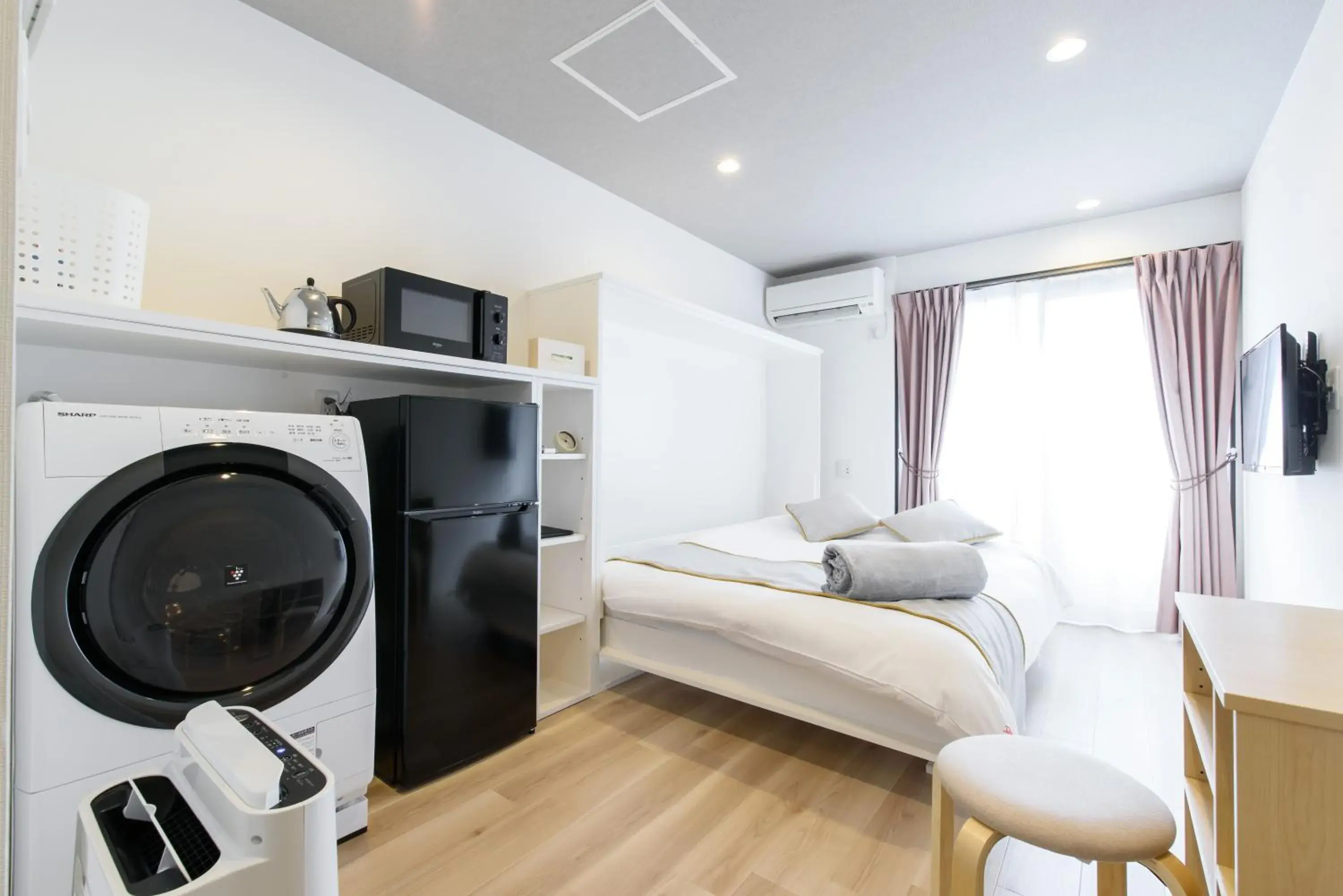 Bed in JP INN Kyoto Ekimae Izutsucho Bed in JP INN Kyoto Ekimae Izutsucho