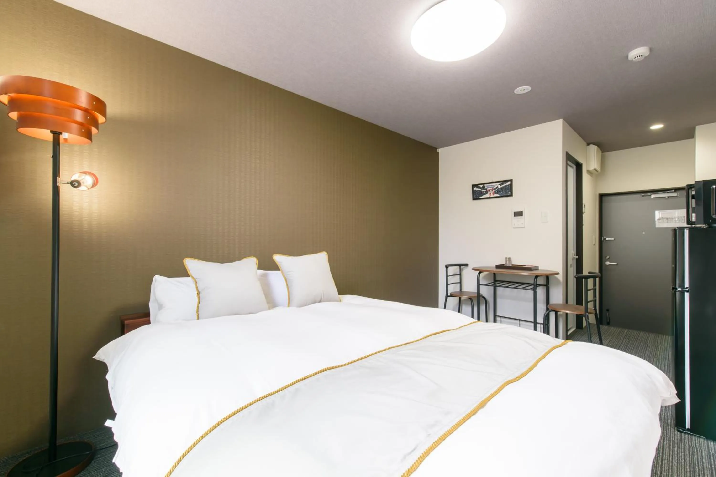 Bed in JP INN Kyotoeki Kita Gakurincho