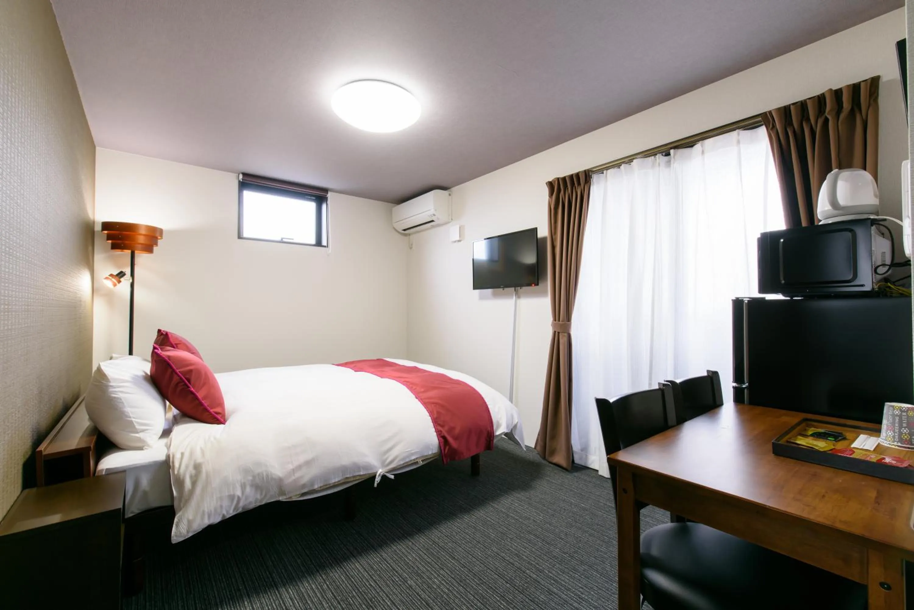 Bed in JP INN Kyotoeki Kita Gakurincho