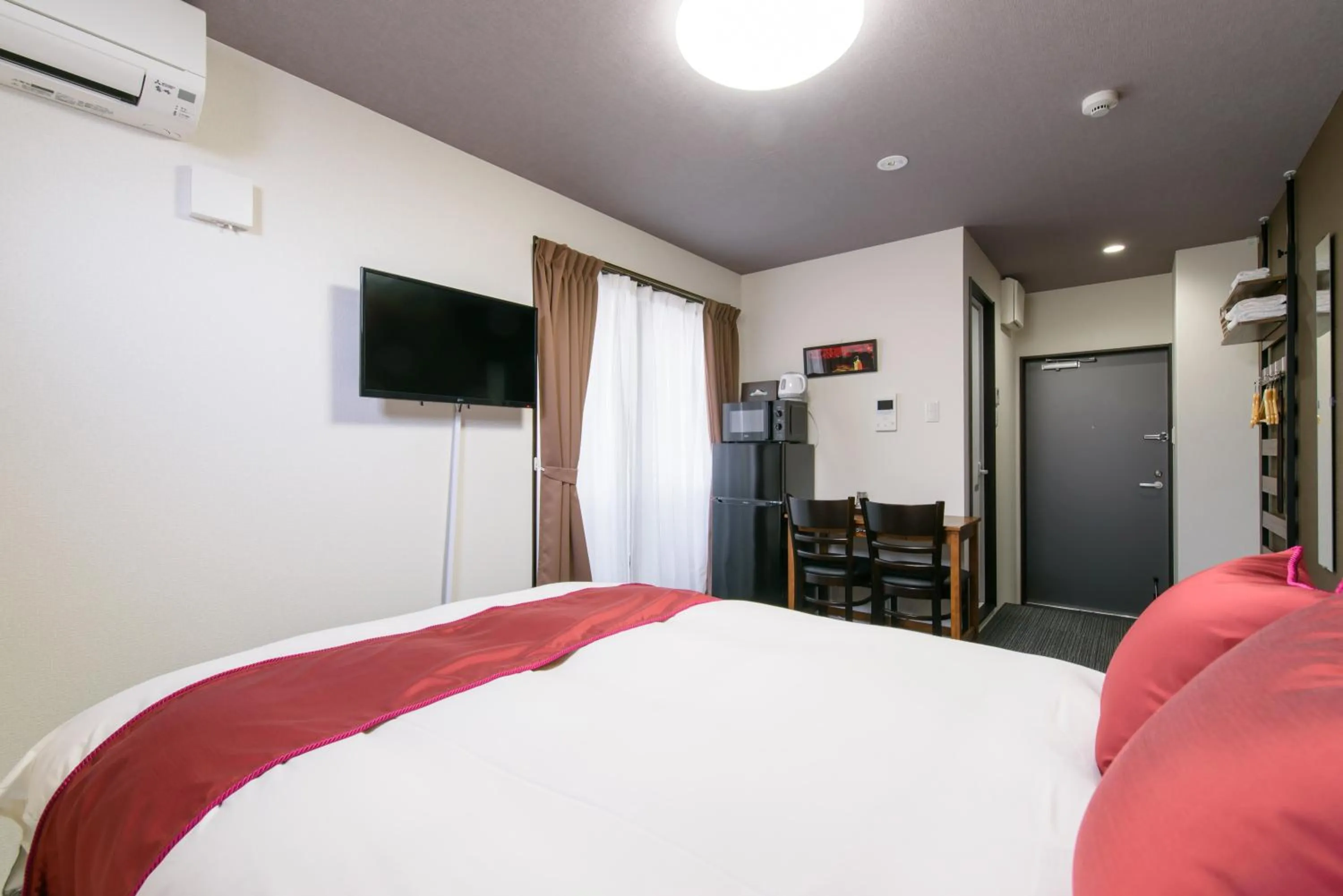 Bed in JP INN Kyotoeki Kita Gakurincho