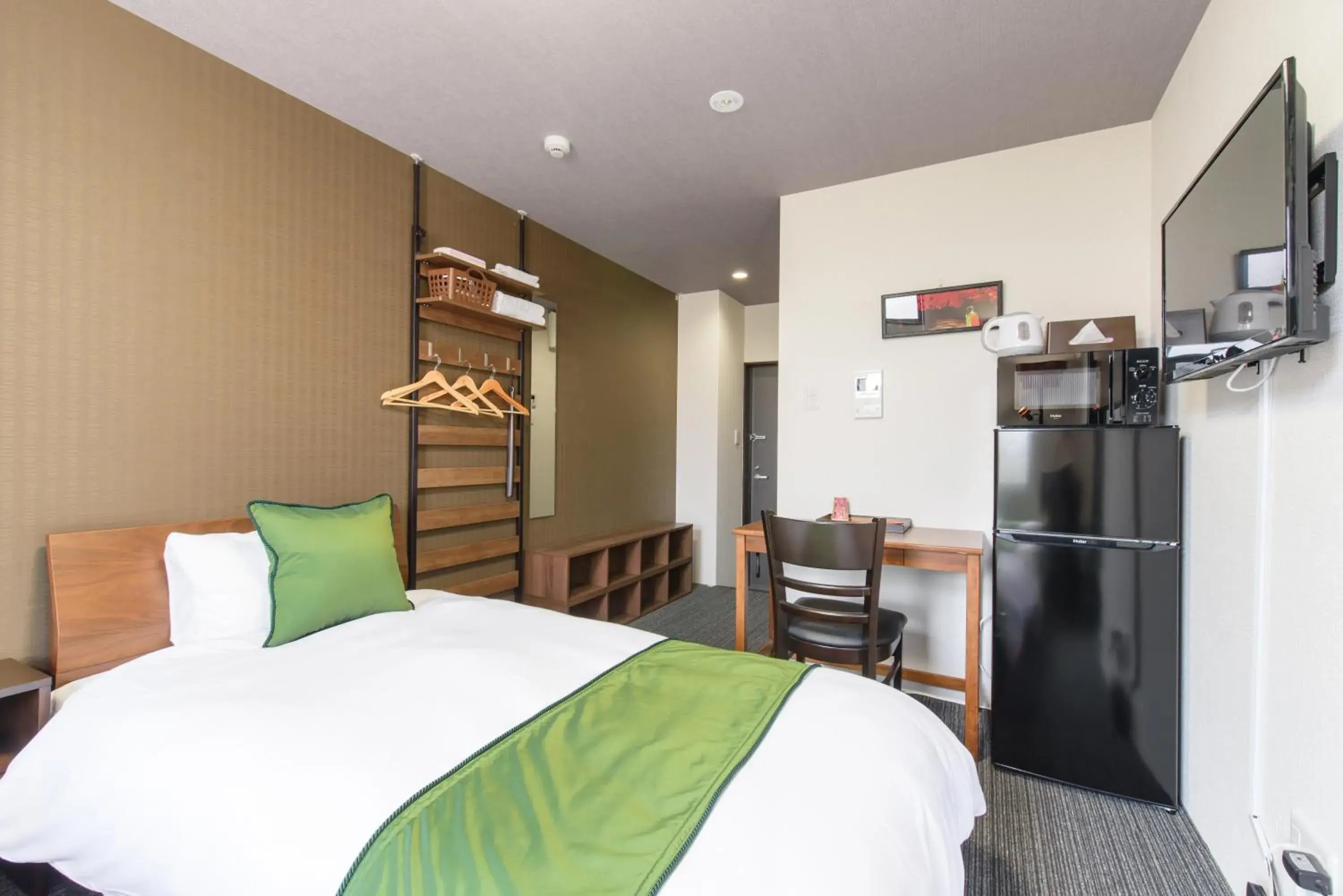 Bed in JP INN Kyotoeki Kita Gakurincho Bed in JP INN Kyotoeki Kita Gakurincho