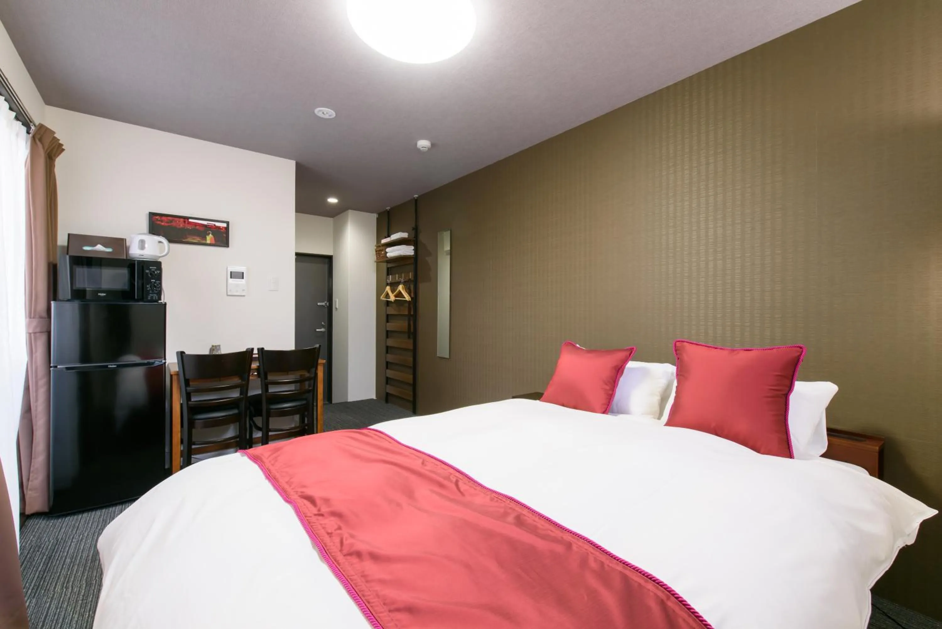 Bed in JP INN Kyotoeki Kita Gakurincho