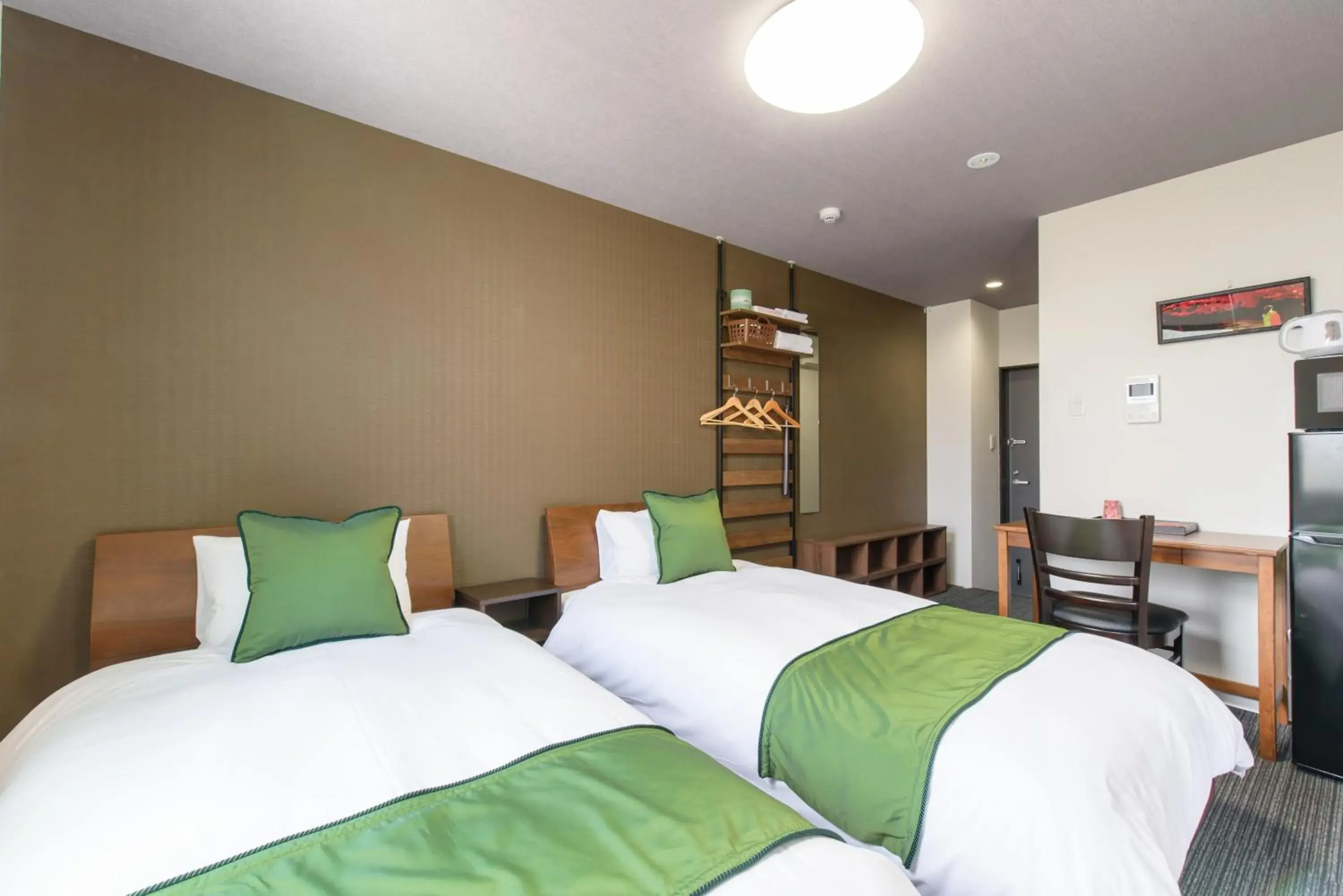 Bed in JP INN Kyotoeki Kita Gakurincho Bed in JP INN Kyotoeki Kita Gakurincho