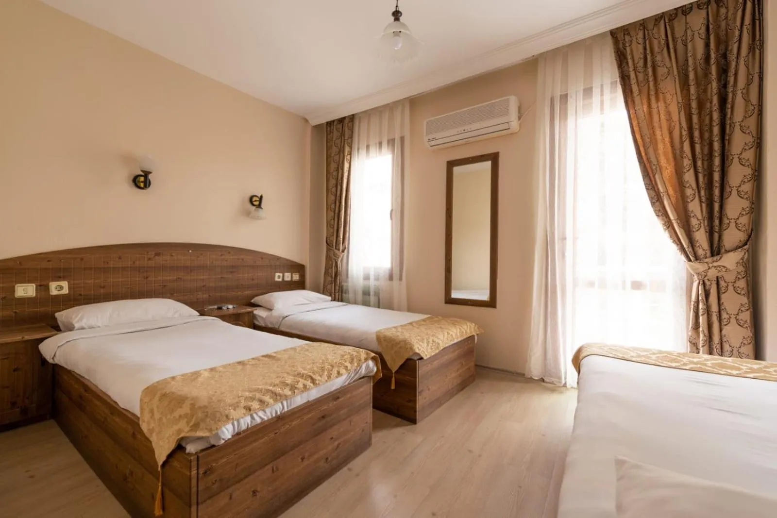 Bed in LİMON OTEL FOÇA