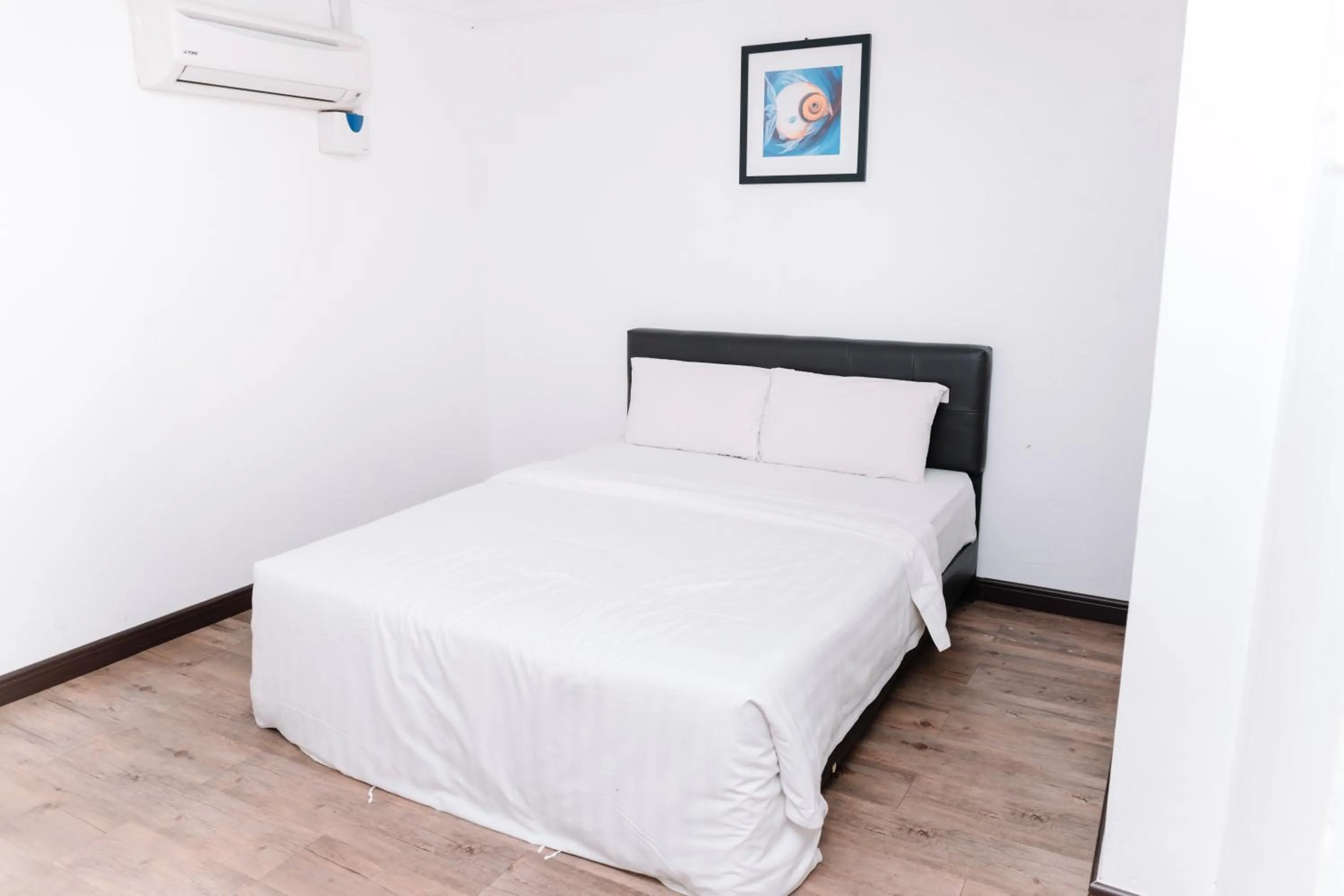 Bed in Ridel Sunset Hotel