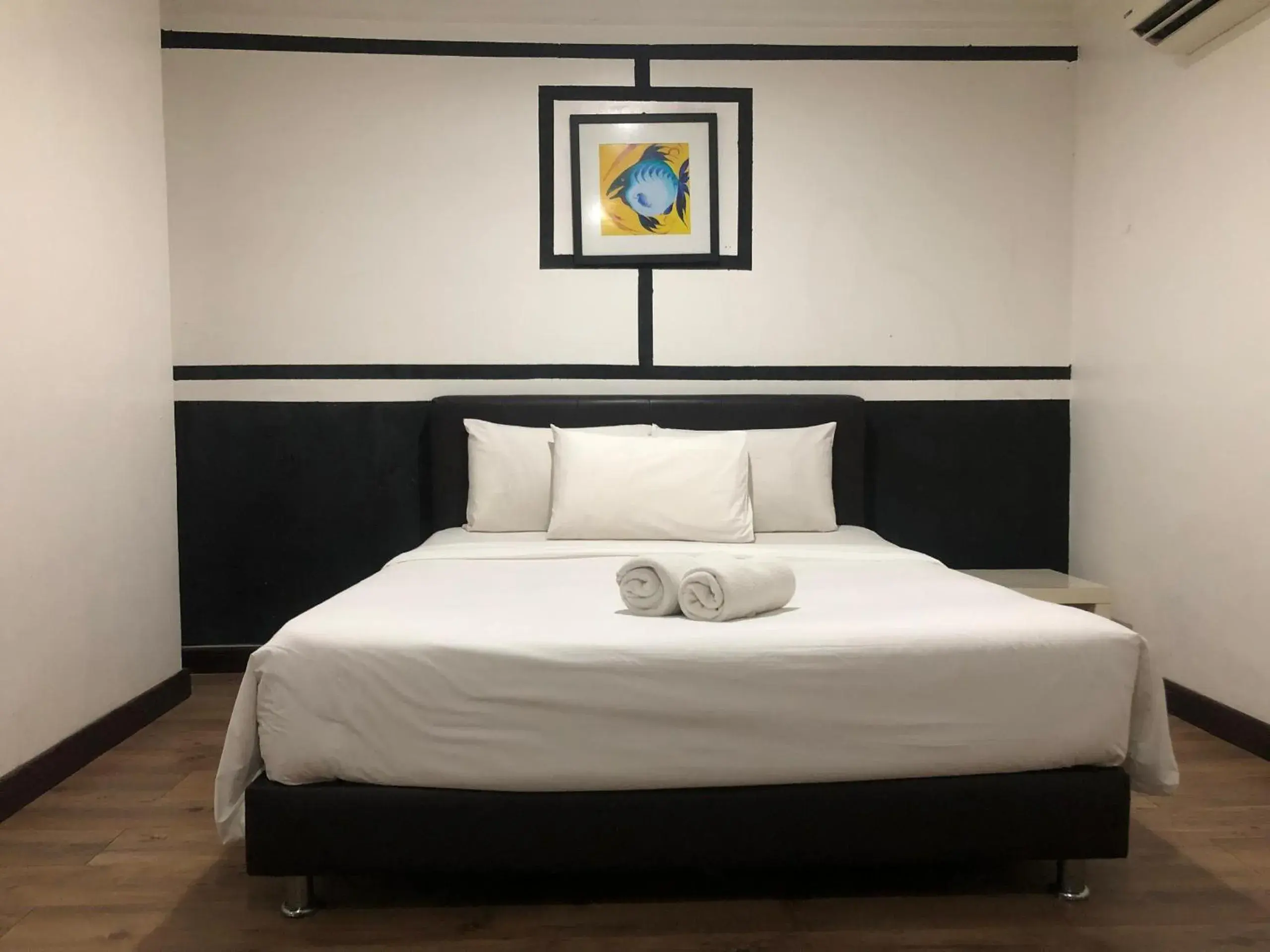 Bed in Ridel Sunset Hotel Bed in Ridel Sunset Hotel