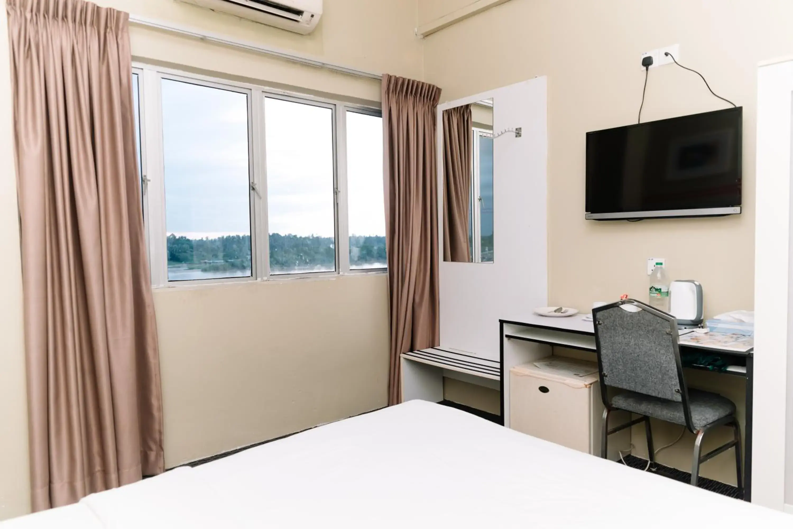 Bed in Ridel Sunset Hotel Bed in Ridel Sunset Hotel