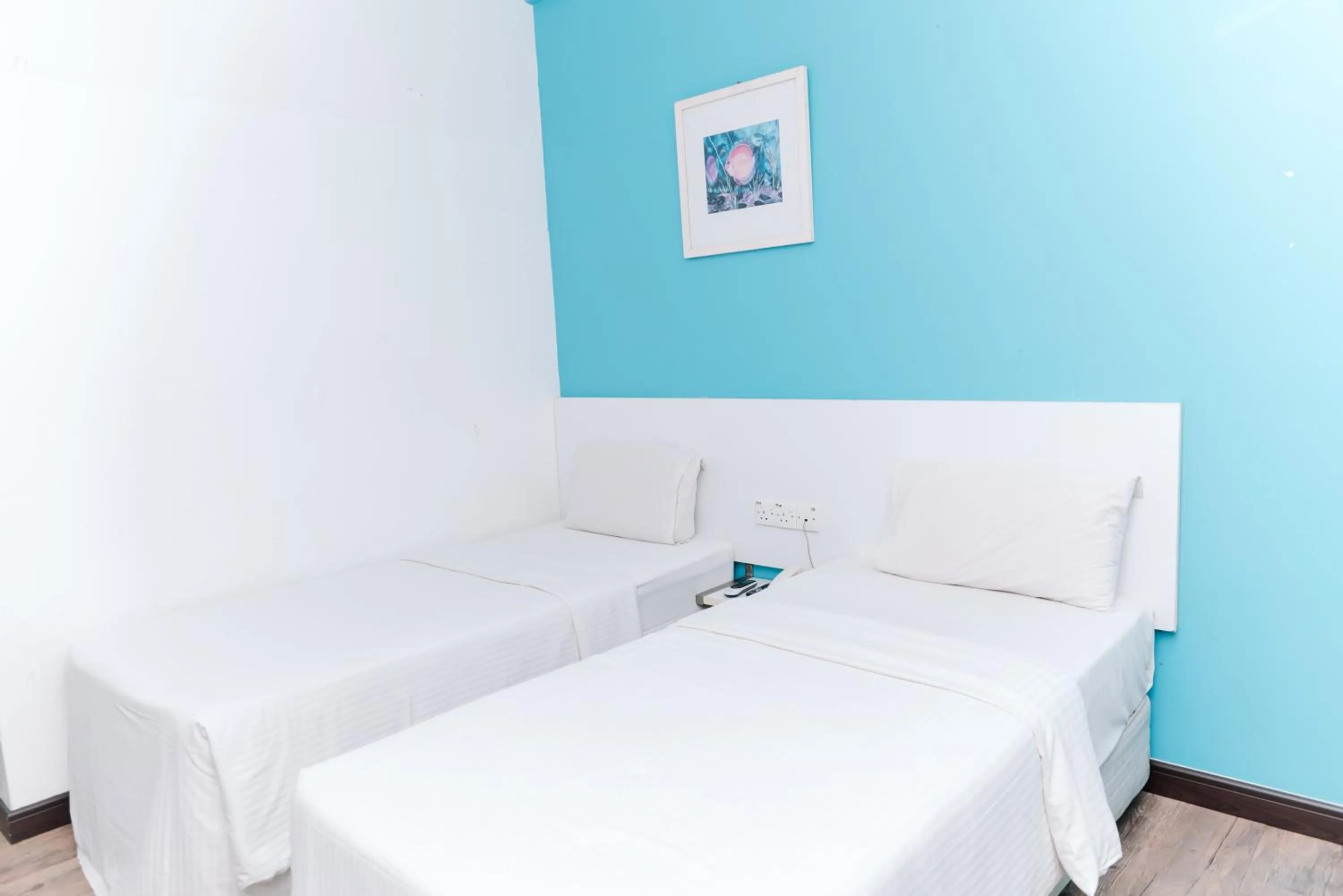 Bed in Ridel Sunset Hotel