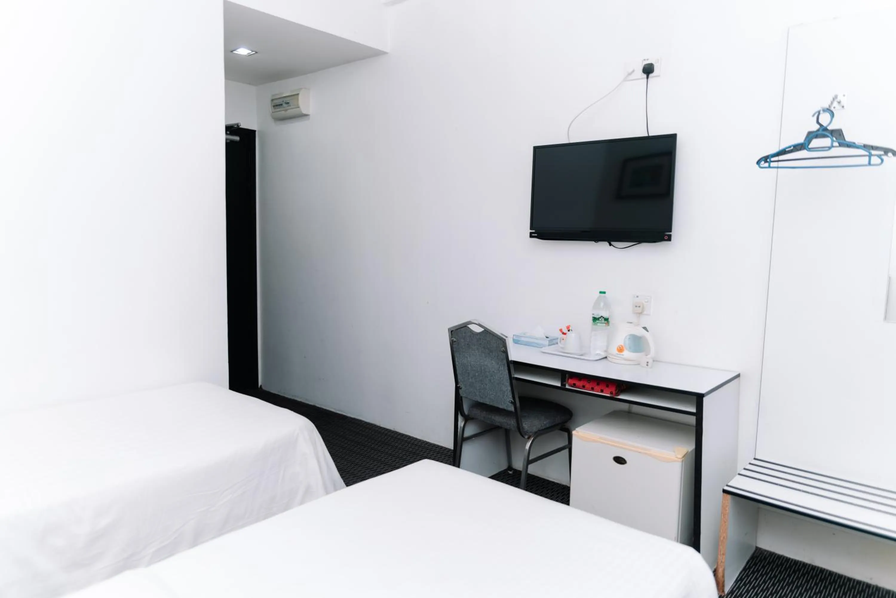 Bed in Ridel Sunset Hotel