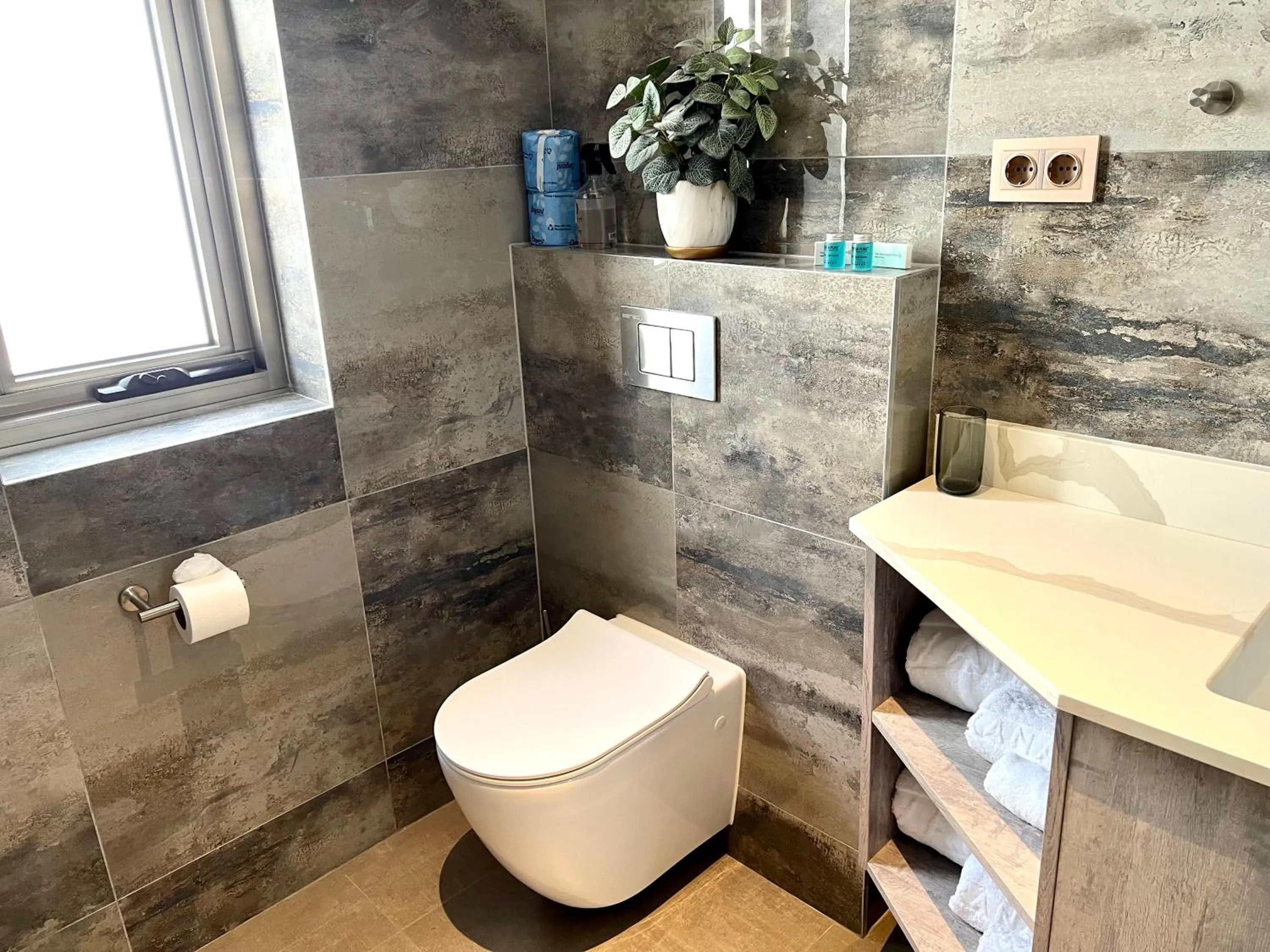 Toilet in Xanadu Apartments at Blue Bay Golf & Beach Resort