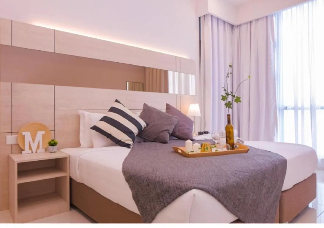 Bed in Robertson PanoramaKL Suites