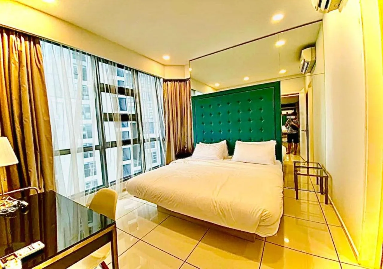 Bed in Robertson PanoramaKL Suites