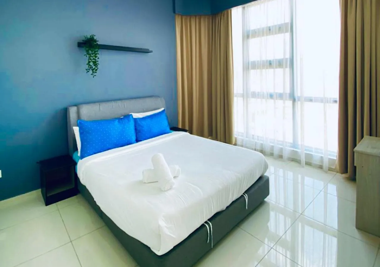 Bed in Robertson PanoramaKL Suites