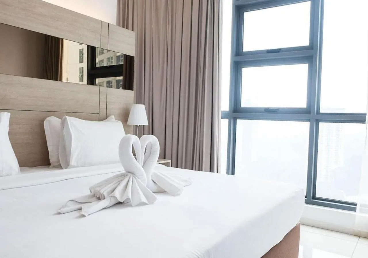 Bed in Robertson PanoramaKL Suites