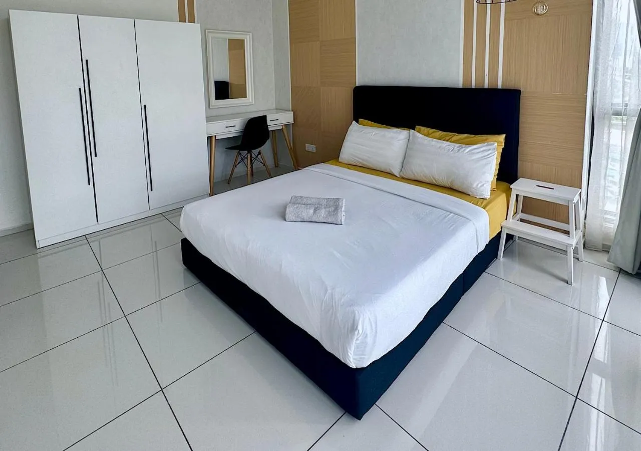 Bed in Robertson PanoramaKL Suites