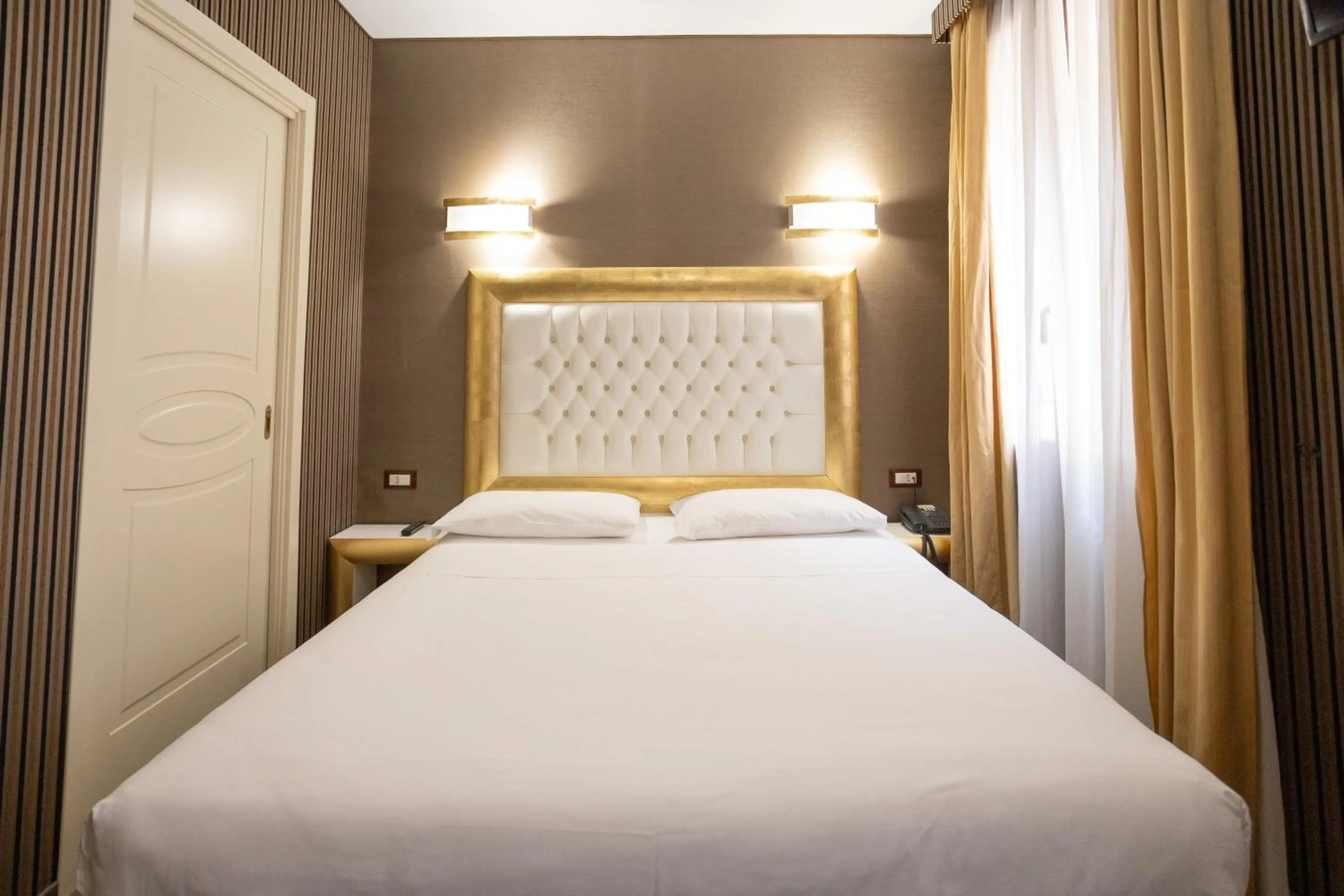 Bed in Duomo Boutique Hotel