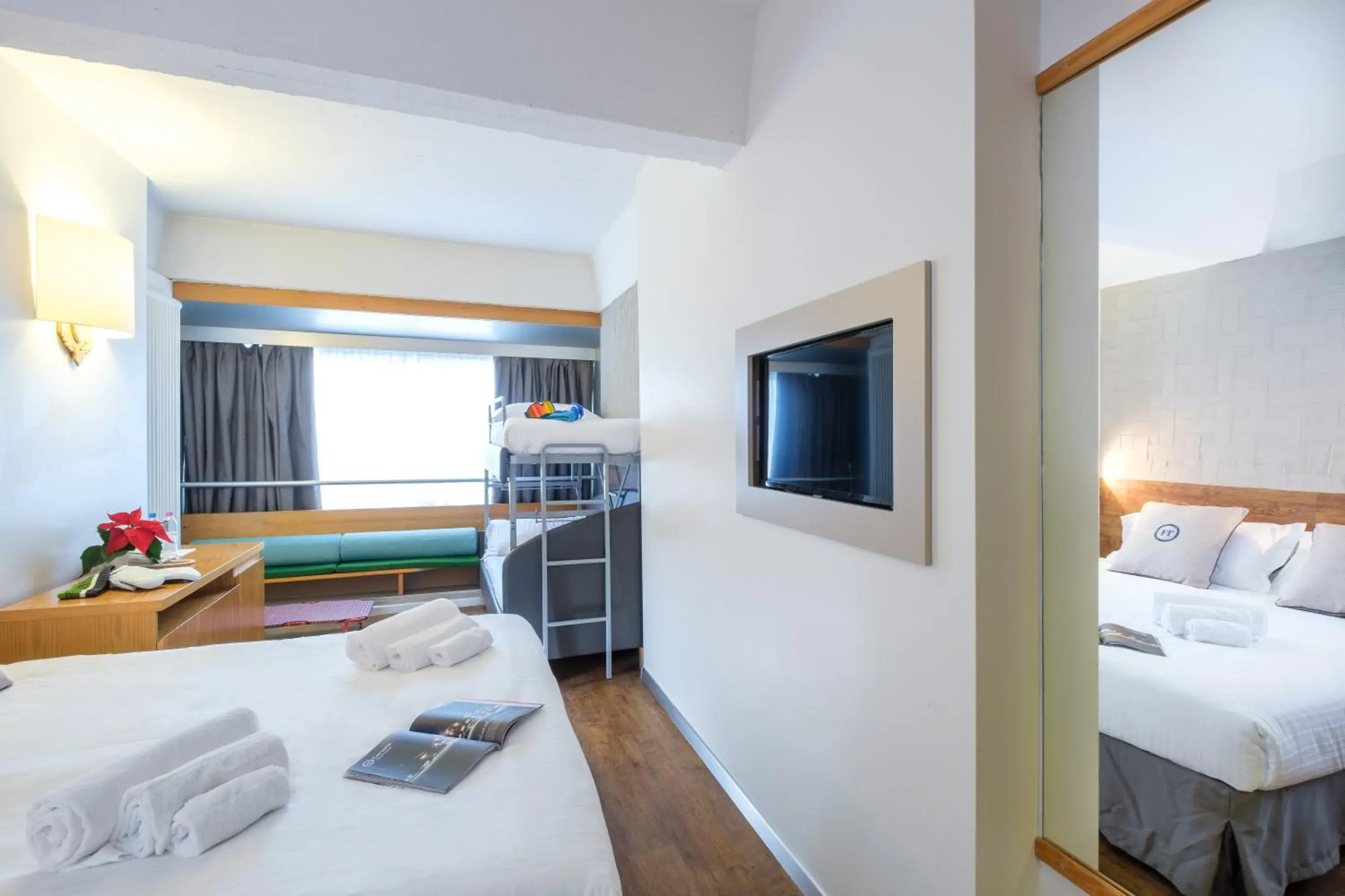 Quadruple Room (2 Adults + 2 Children) in TH Marilleva Quadruple Room (2 Adults + 2 Children) in TH Marilleva