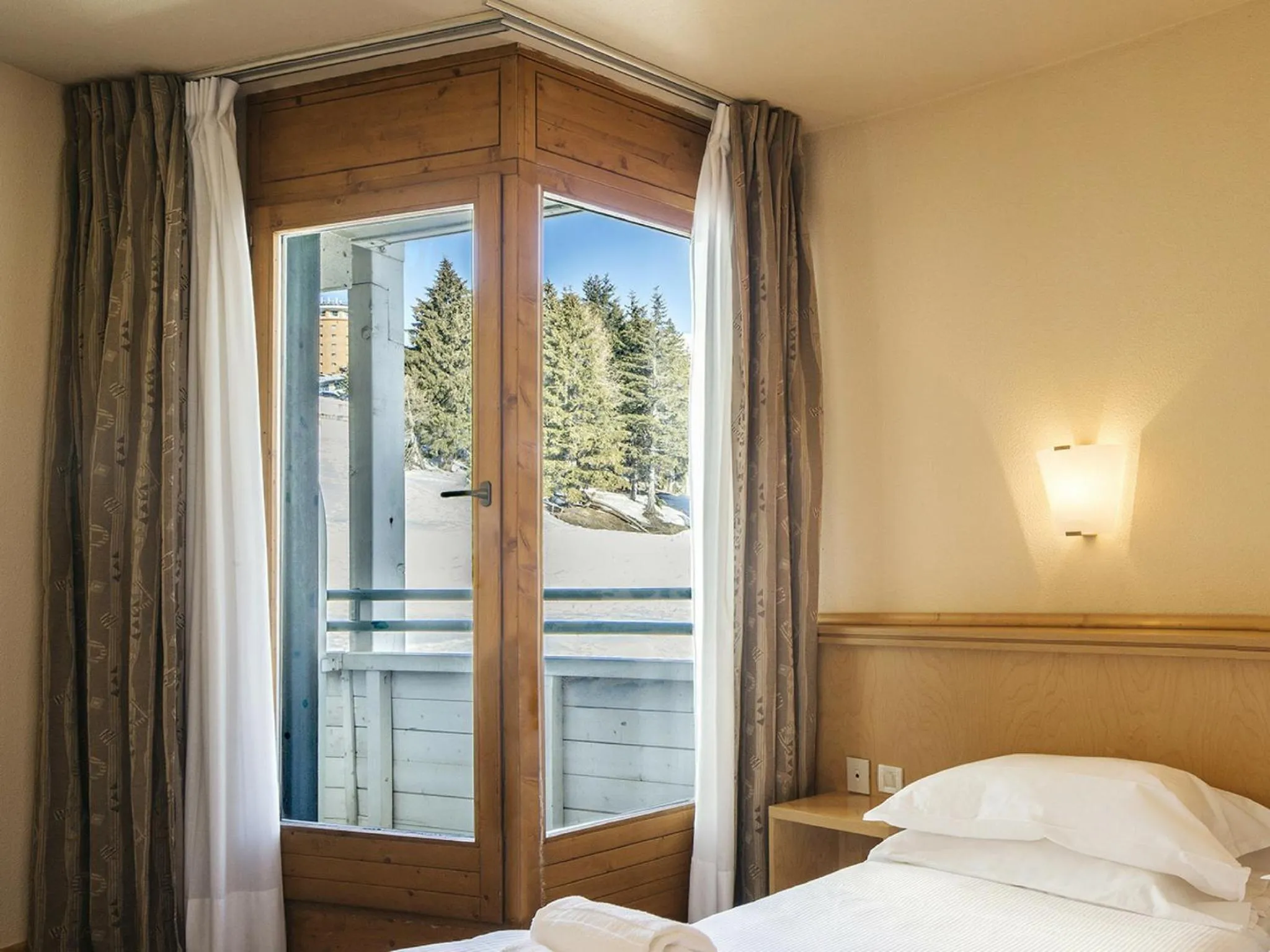 Bed in Hotel Club Uappala Sestriere