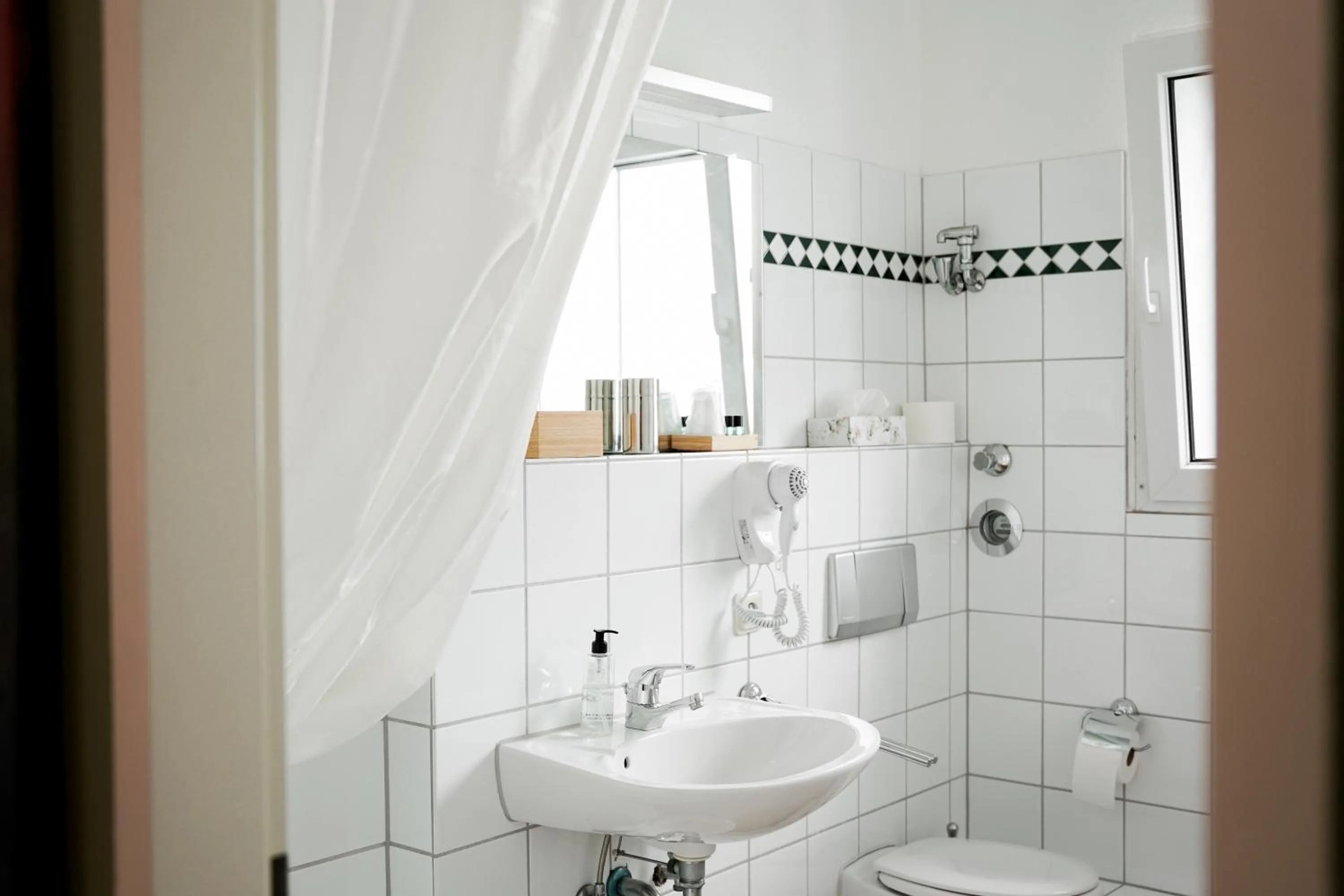 Shower in urraum Hotel