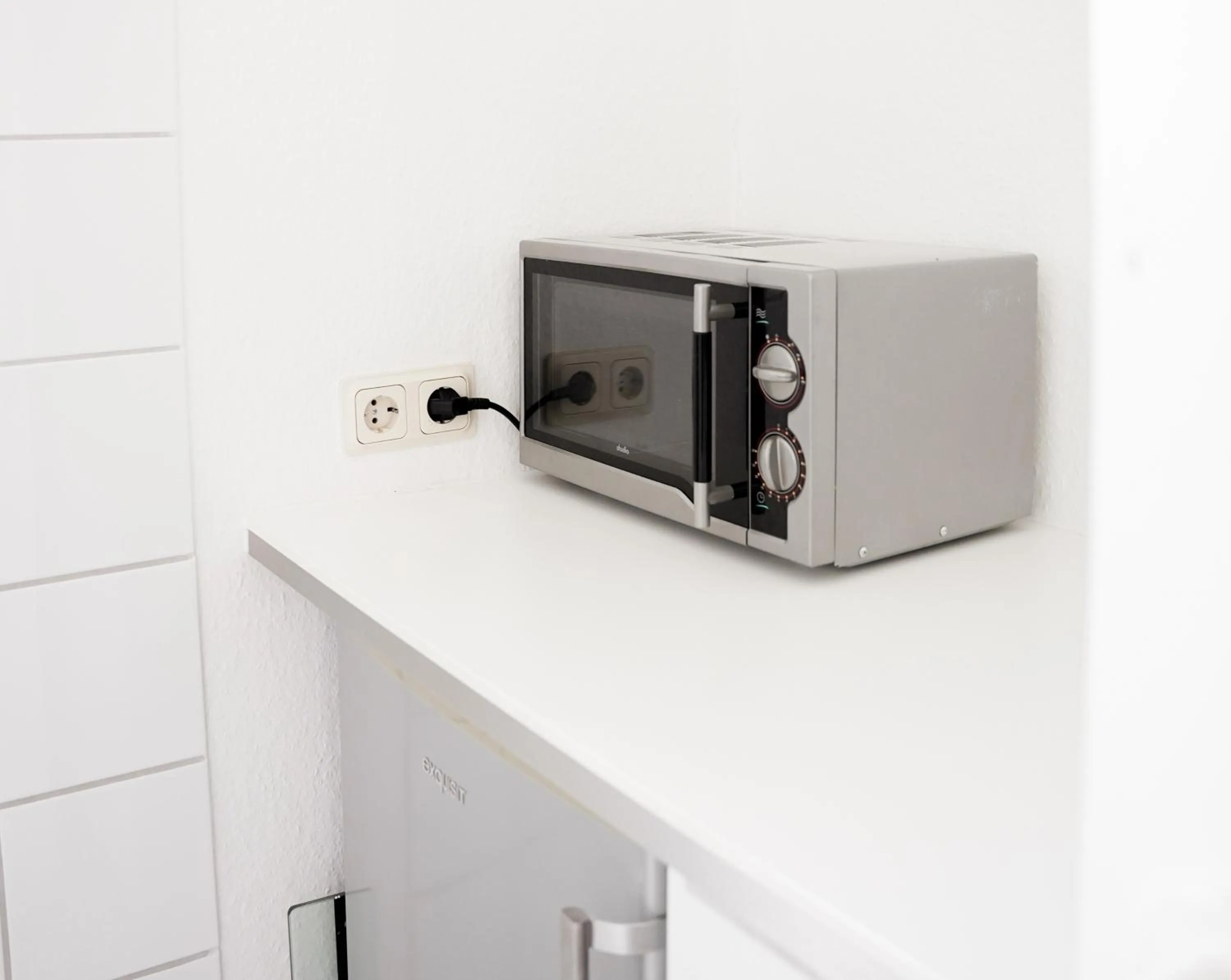 Kitchen or kitchenette in urraum Hotel