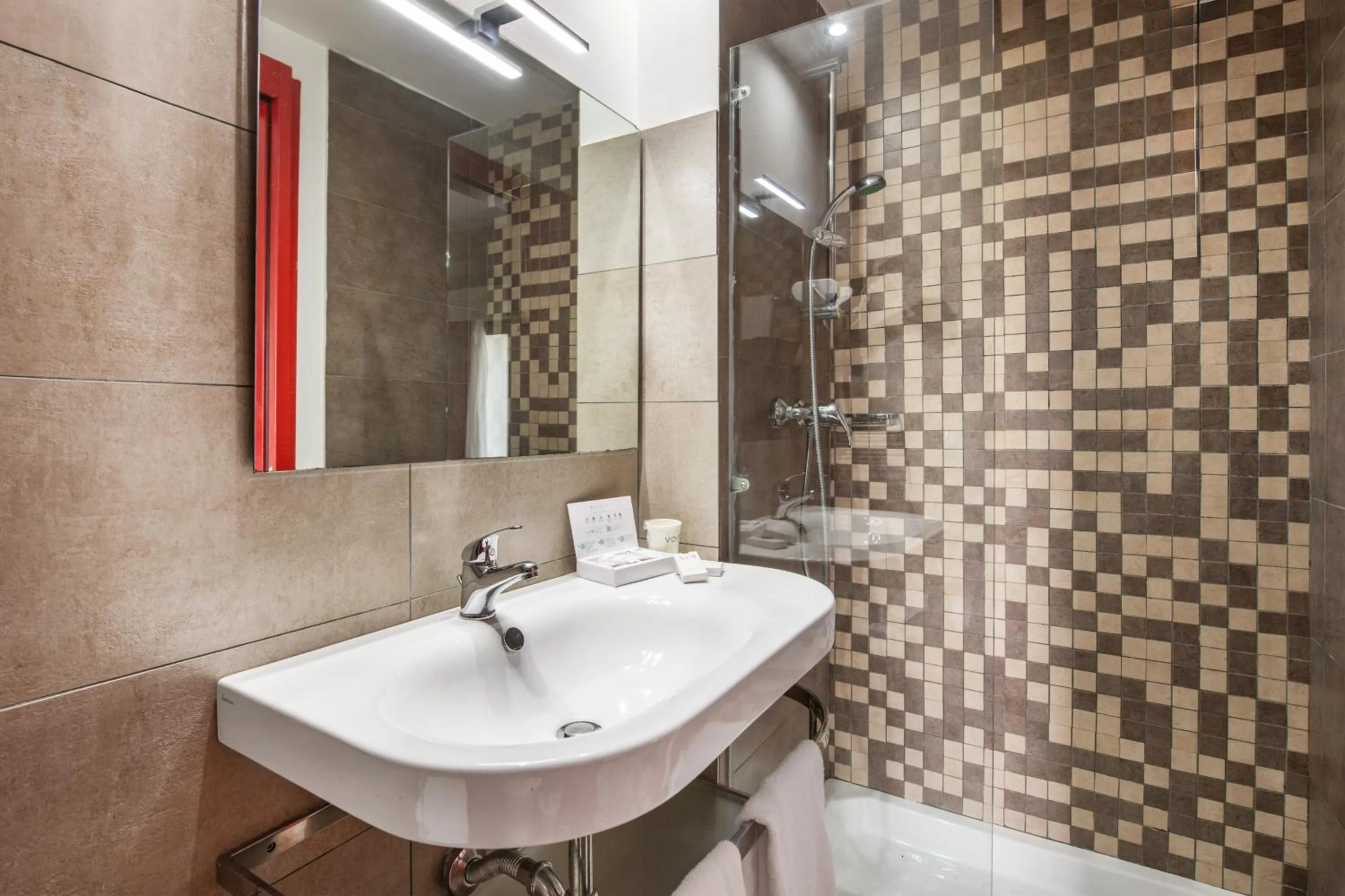 Bathroom in VOI Alimini Resort