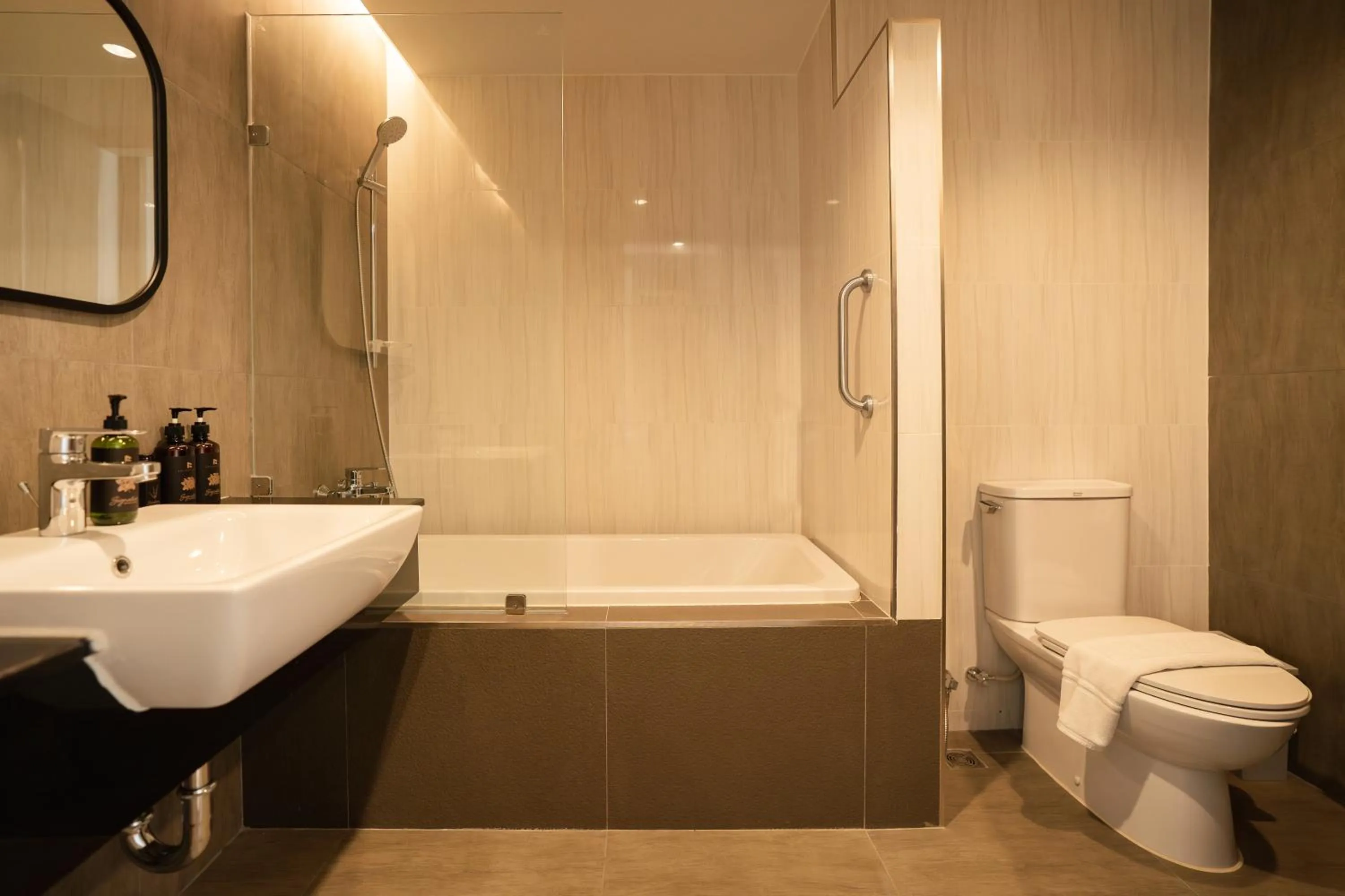 Bathroom in The Rise Suites Hotel, Chiang Mai - SHA Extra Plus