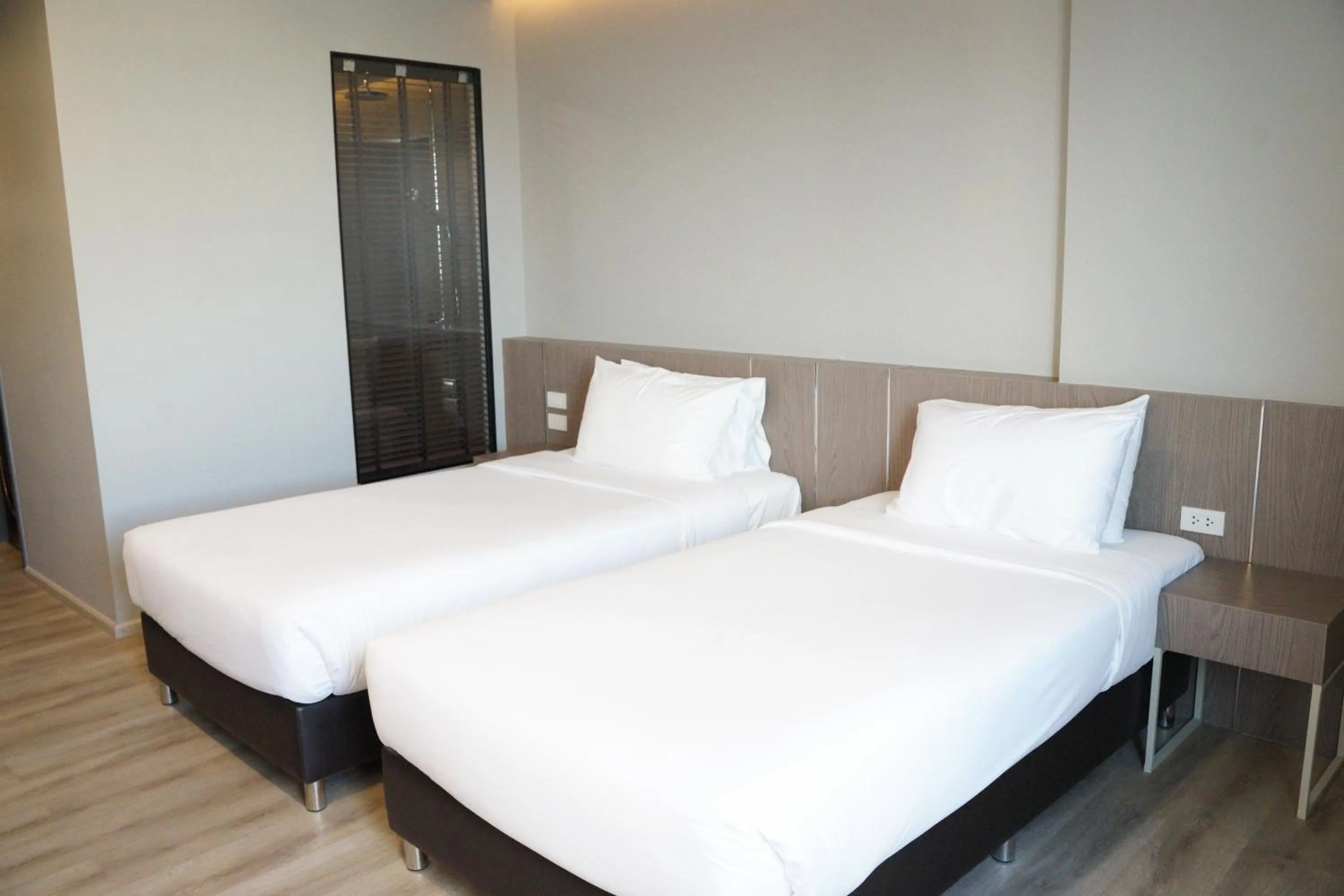 Bed in The Rise Suites Hotel, Chiang Mai - SHA Extra Plus