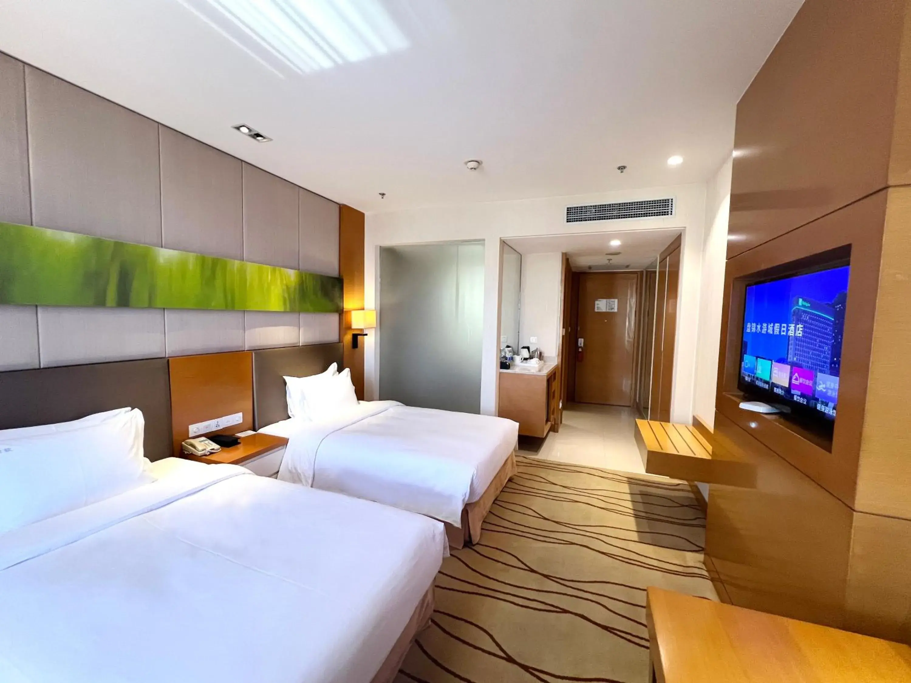 Bed in Holiday Inn Panjin Aqua City by IHG Bed in Holiday Inn Panjin Aqua City by IHG