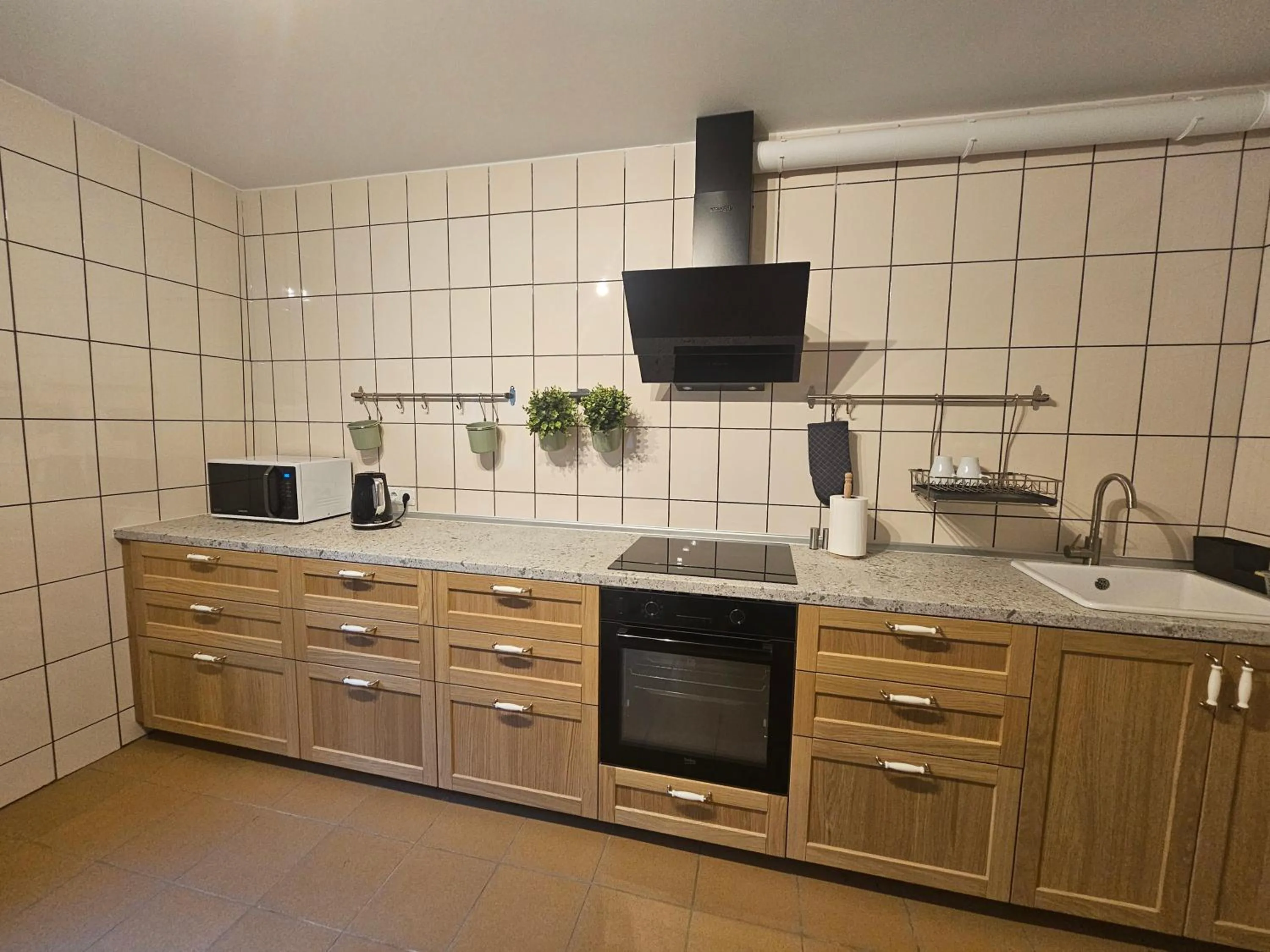 Kitchen or kitchenette in Taujėnų dvaro svečių namai