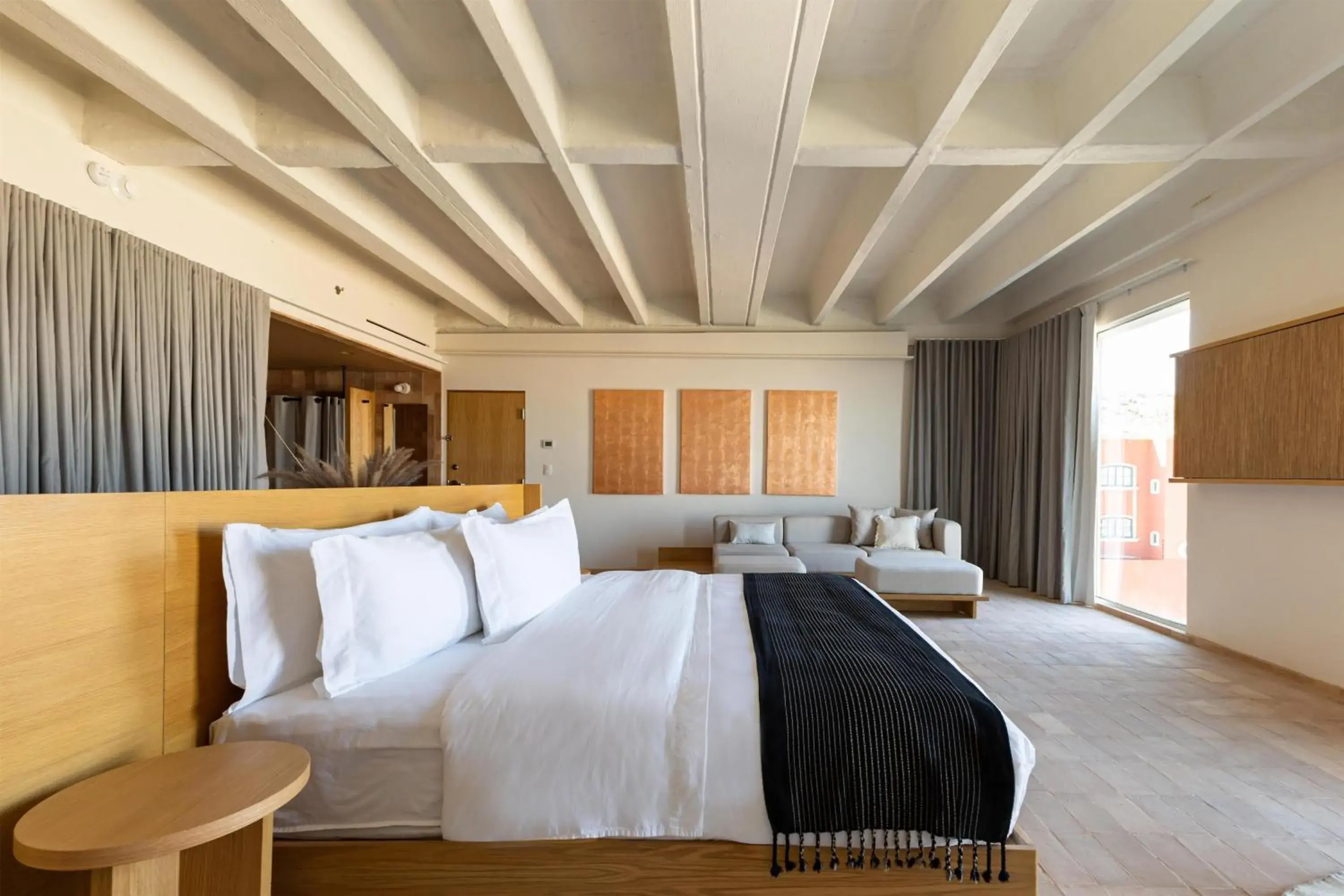 Living room, Bed in Albor San Miguel de Allende, Tapestry Collection by Hilton Living room, Bed in Albor San Miguel de Allende, Tapestry Collection by Hilton