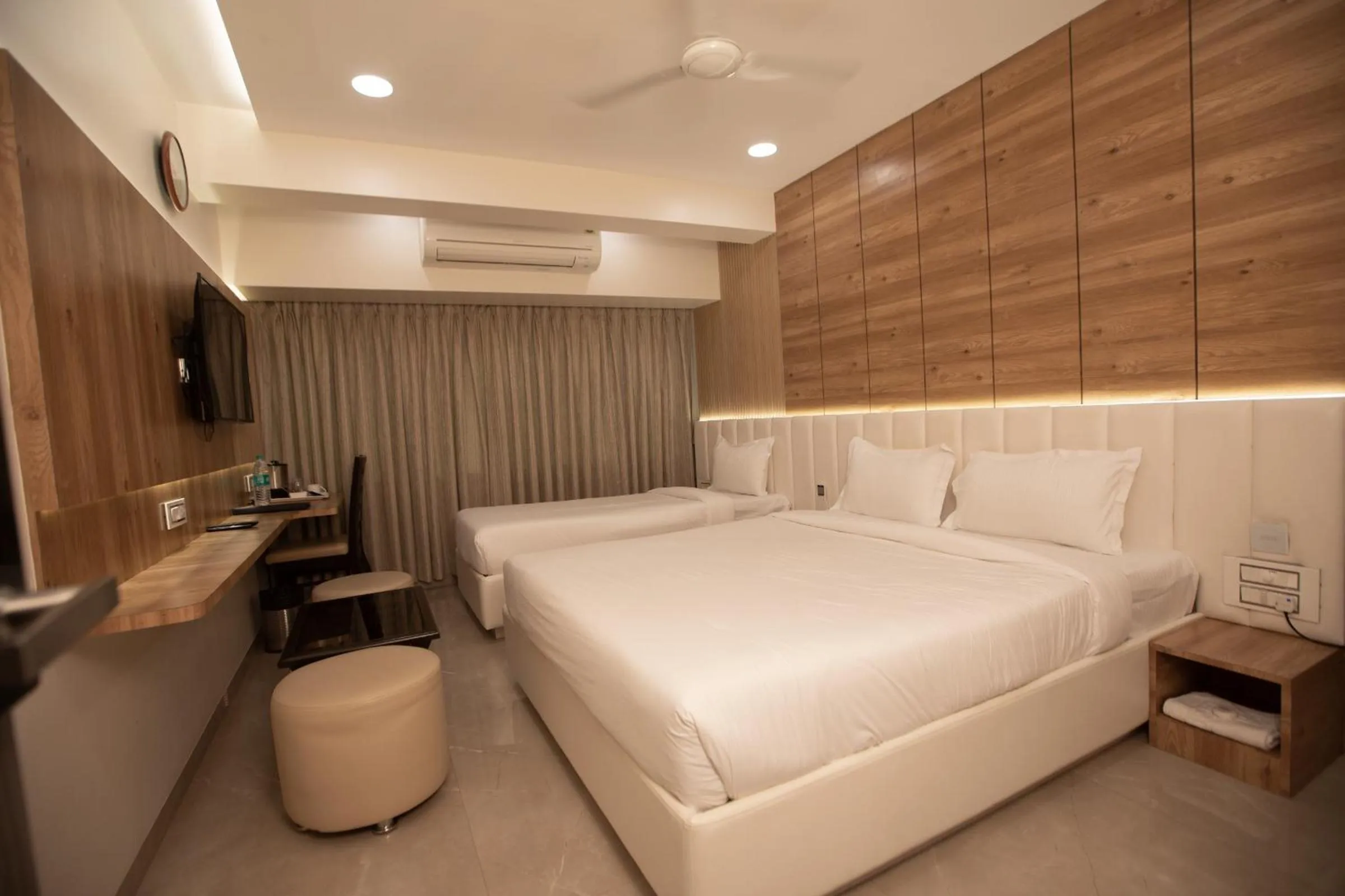 Bed in Hotel Naaz Executive