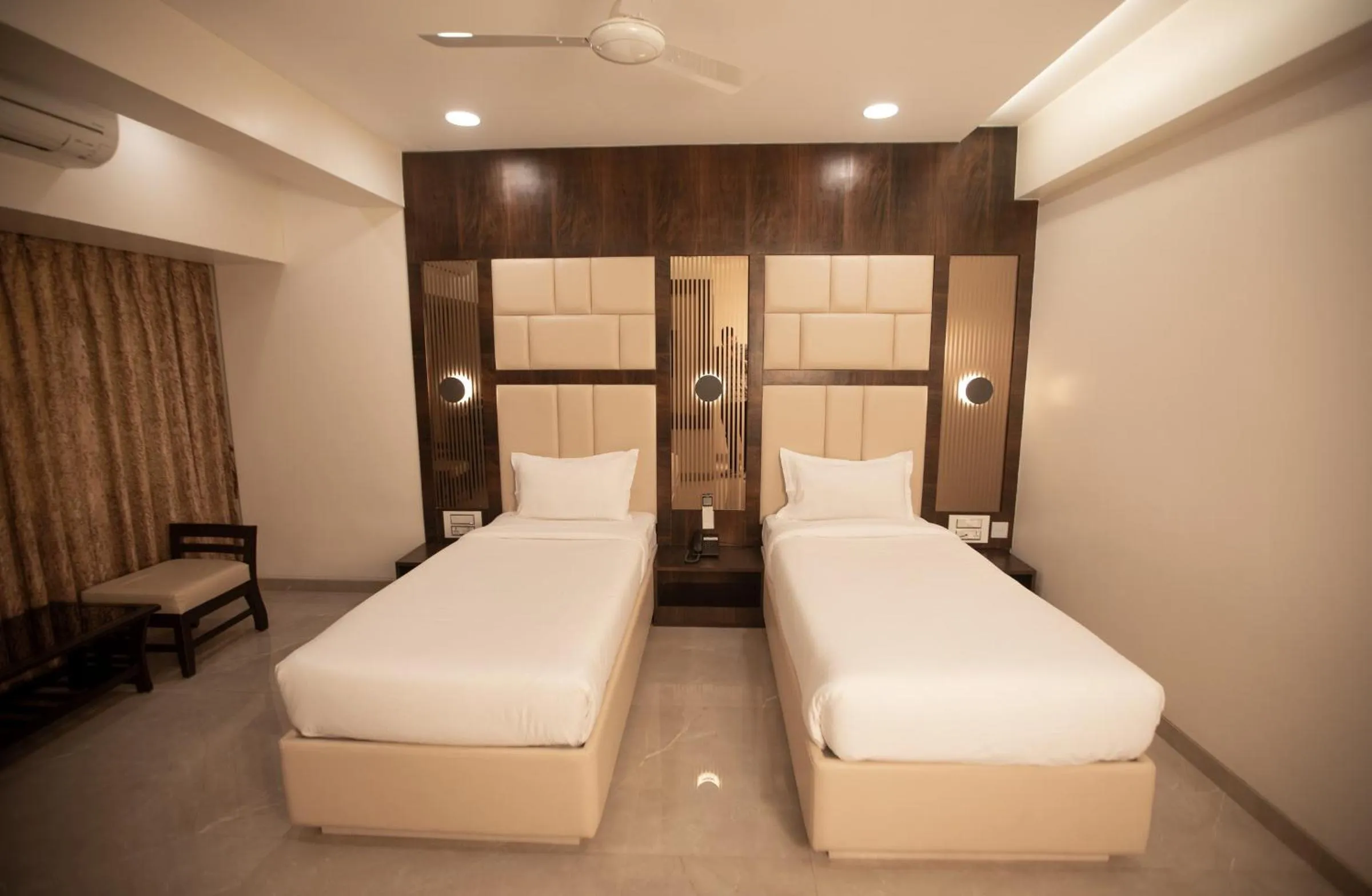 Bed in Hotel Naaz Executive