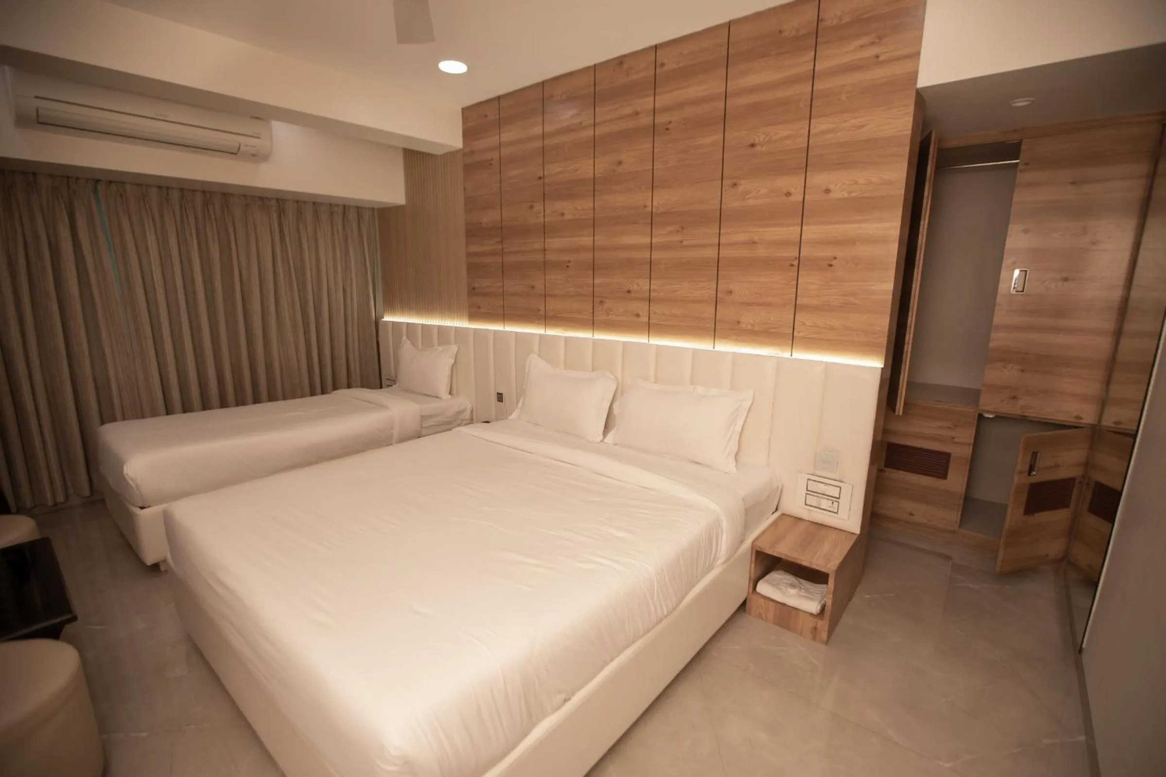 Bed in Hotel Naaz Executive