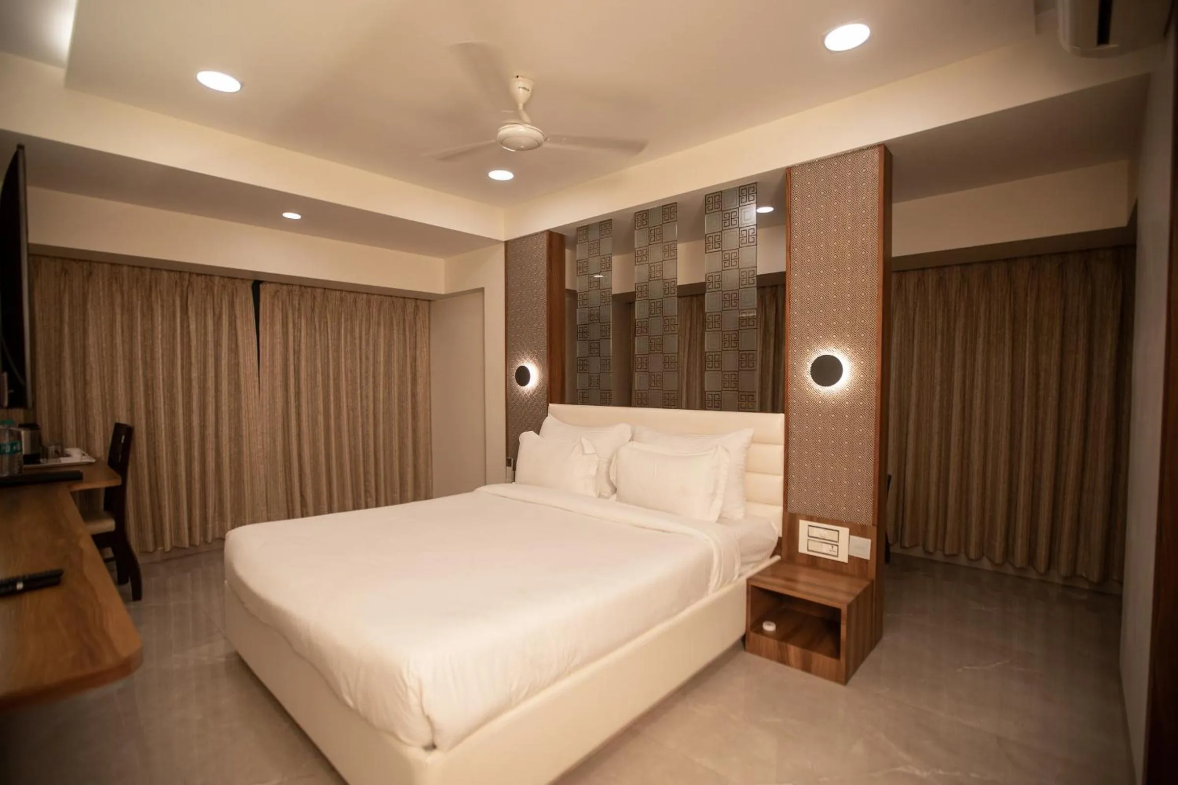 Bed in Hotel Naaz Executive