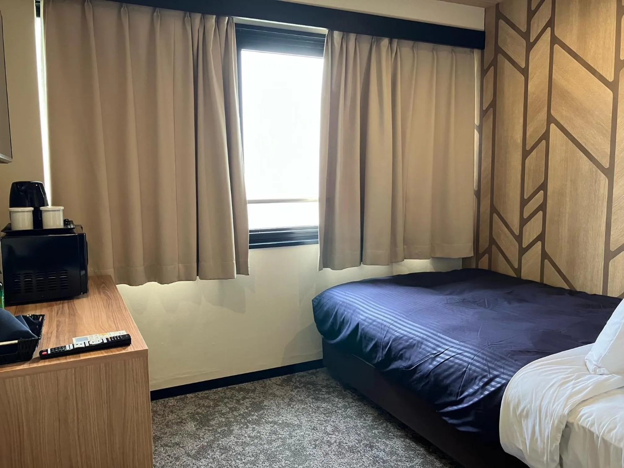 Bed in Hotel Livemax BUDGET Umeda