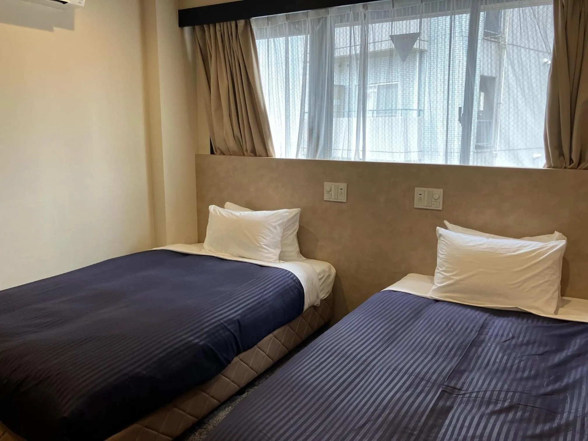 Bed in Hotel Livemax BUDGET Umeda