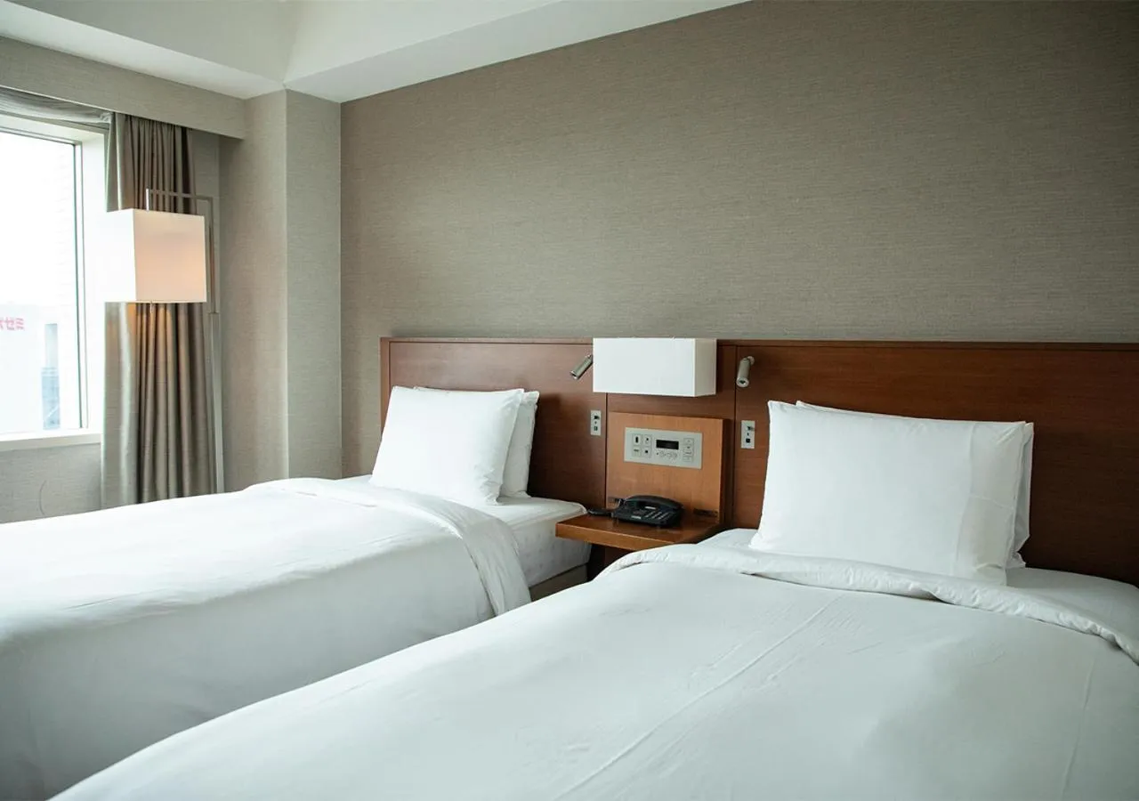 Bed in Odakyu Hotel Century Southern Tower